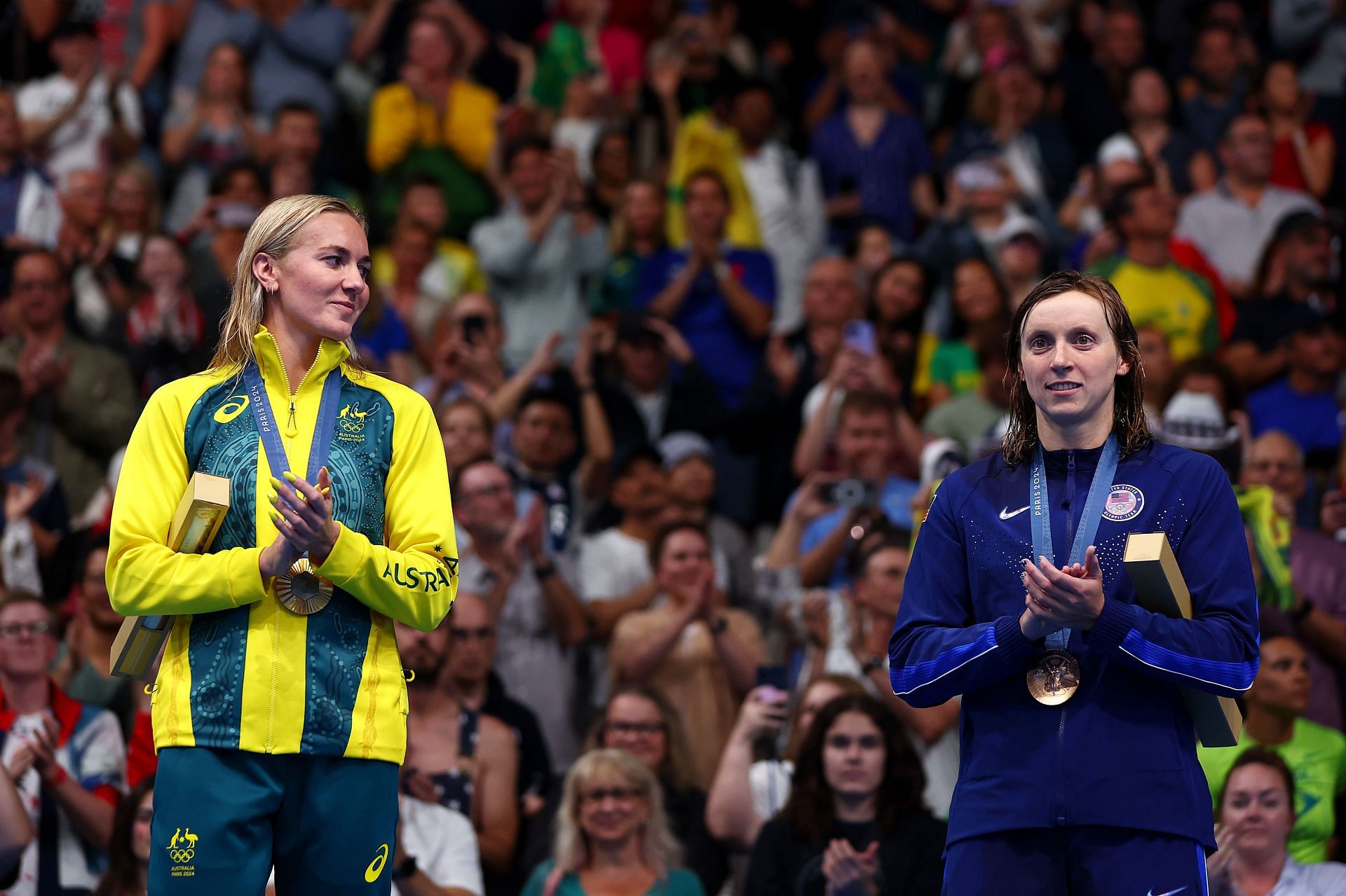 Gold Medalist Ariarne Titmus of Australia with bronze medalist Katie Ledecky of USA at the medal ceremony [Image Source: Getty]