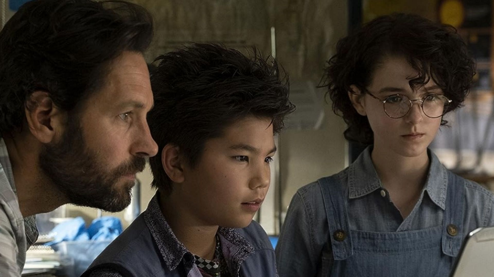 Paul Rudd, Logan Kim, and Mckenna Grace in Ghostbusters: Afterlife (2021) image via Columbia Pictures