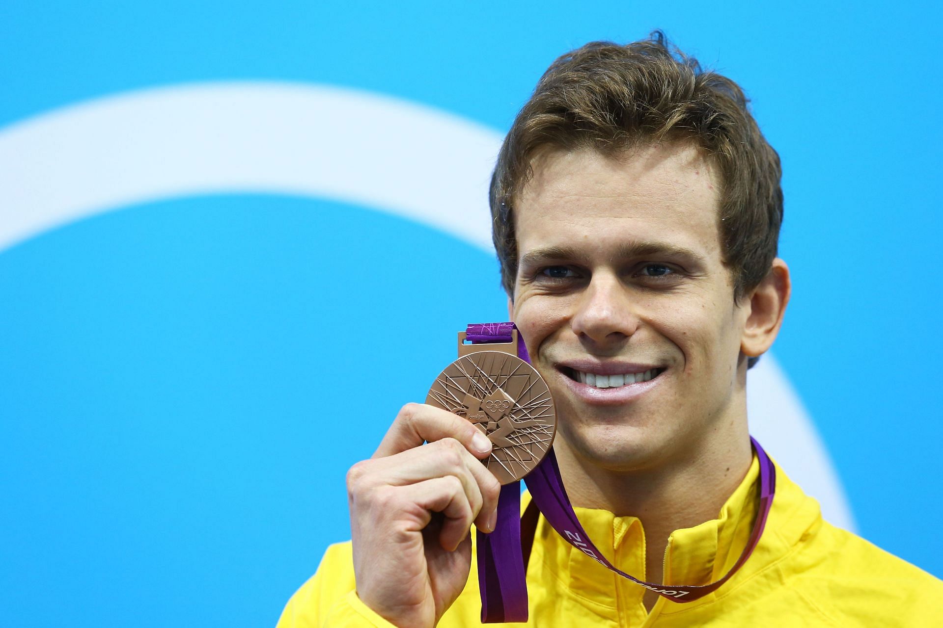 Cesar Cielo with his bronze medal from London Olympics 2012