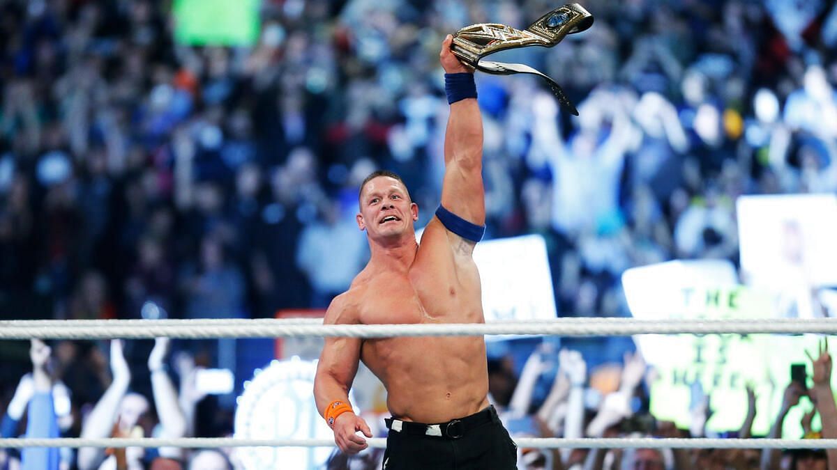 John Cena with the WWE Title [Source: WWE.com]
