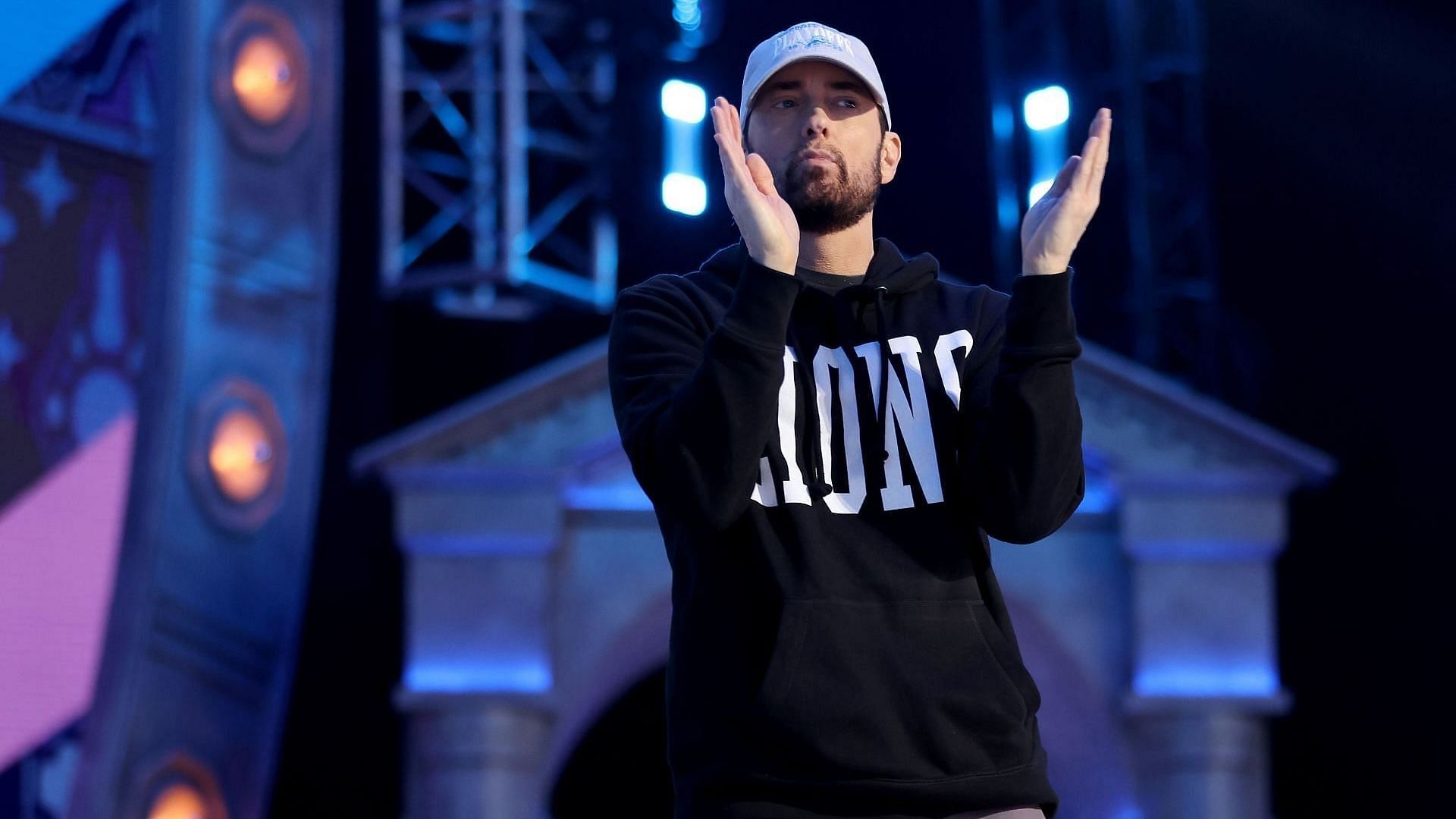 Rapper Marshall &quot;Eminem&quot; Mathers claps during the first round of the 2024 NFL Draft at Campus Martius Park and Hart Plaza on April 25, 2024 in Detroit, Michigan. (Photo by Gregory Shamus/Getty Images)