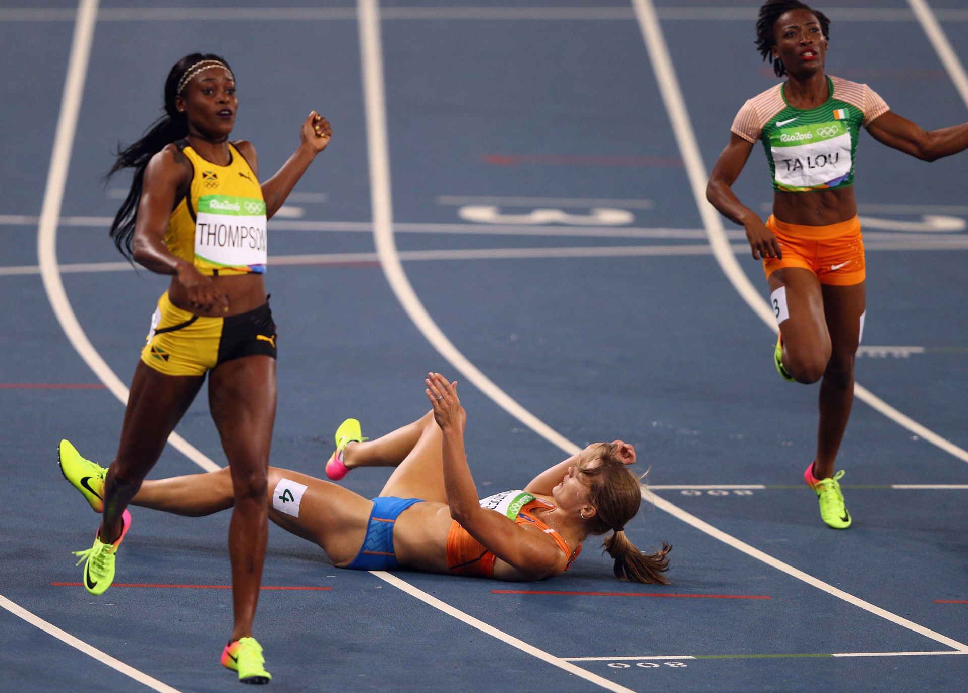 Elaine Thompson-Herah of Jamaica [Extreme Left] crossing the finish line to win women&#039;s 200 m at Rio Olympics [Image Source: Getty]