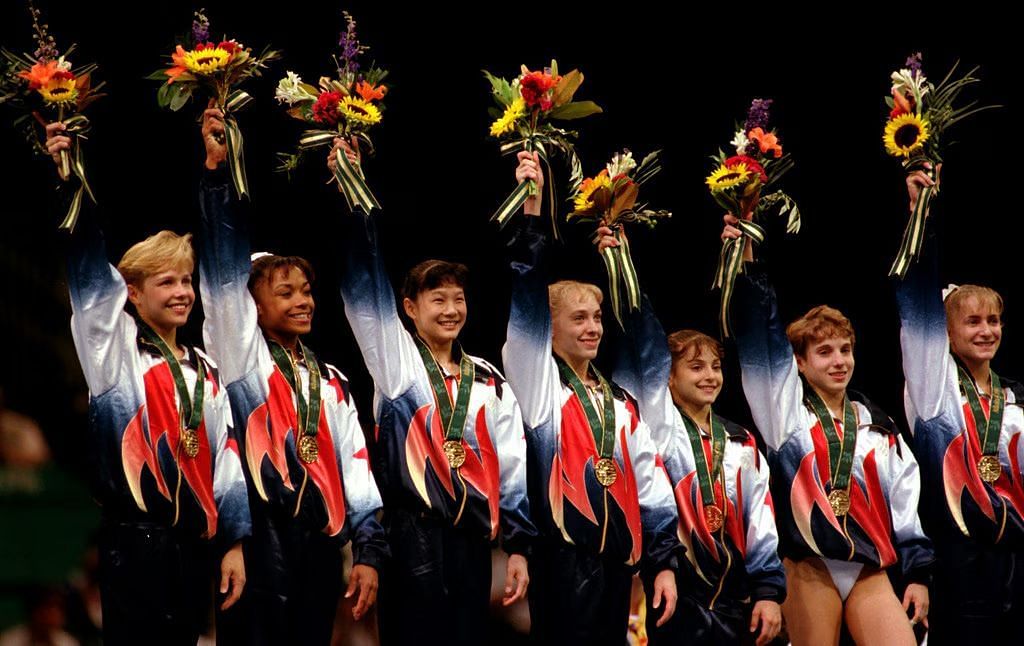 Kerri Strug led the Magnificient Seven to victory even after suffering an ankle injury. (Getty Images)