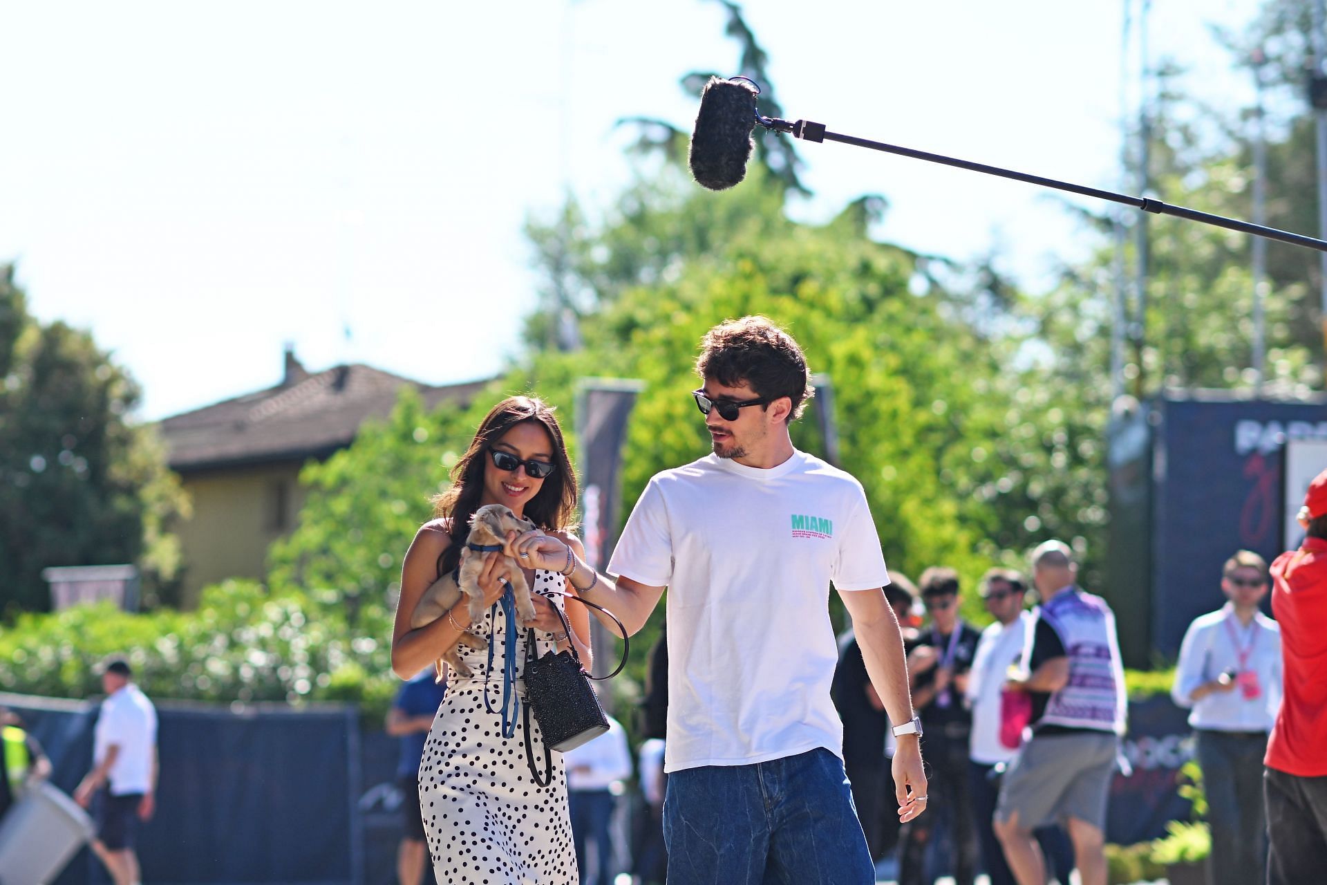 Charles Leclerc and Alexandra Saint Mleux walk in the Paddock prior to final practice ahead of the Emilia Romagna GP. (Photo by Rudy Carezzevoli/Getty Images)