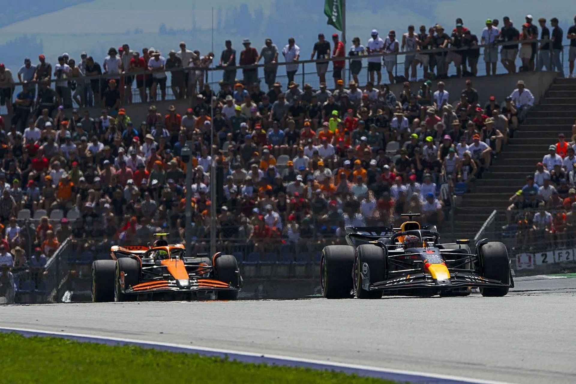 Max Verstappen (1) leads Lando Norris (4) on track during the Sprint ahead of the 2024 F1 Austrian Grand Prix. (Photo by Rudy Carezzevoli/Getty Images)