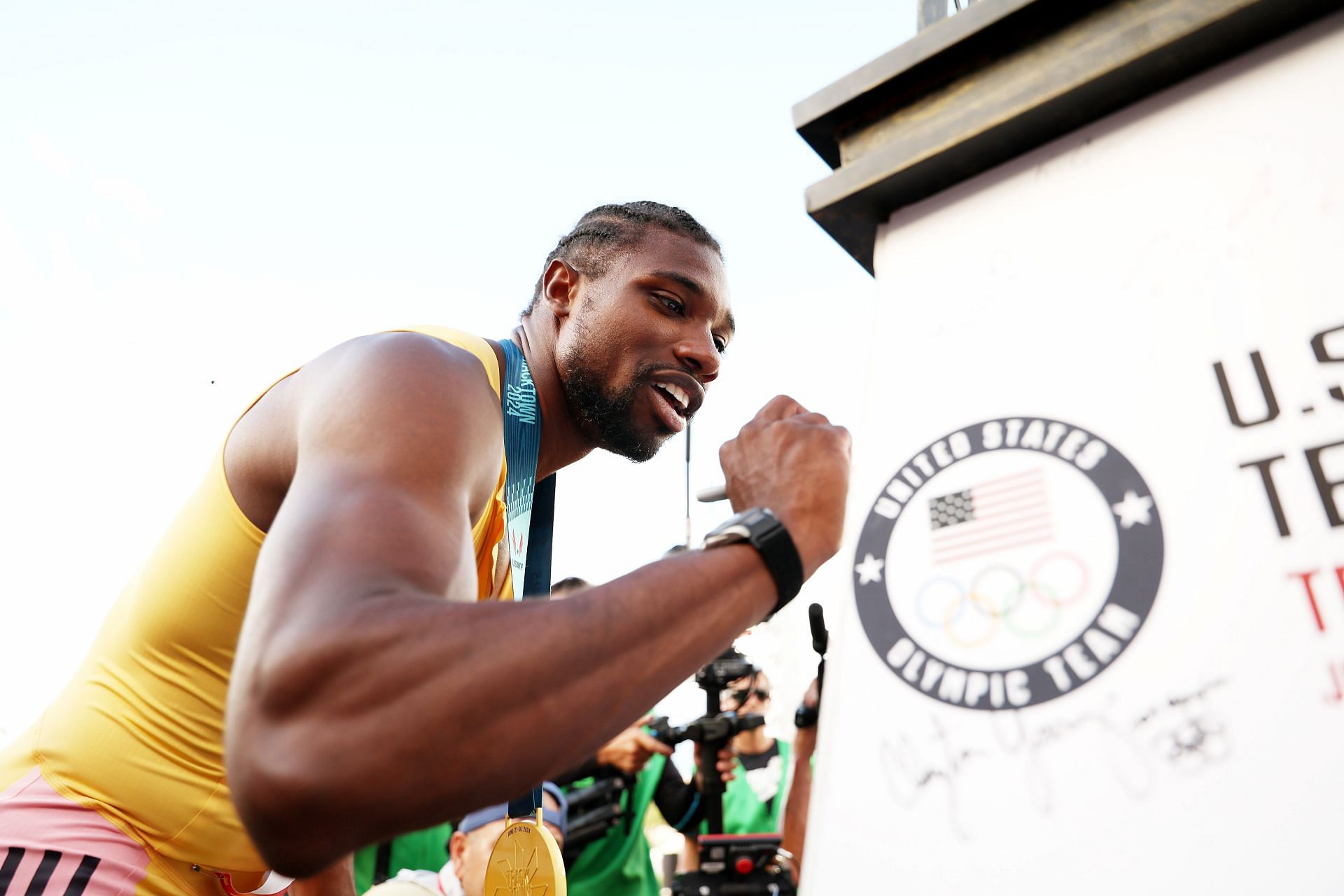 Noah Lyles signs a miniature Eiffel Tower after winning the men&#039;s 200 meter final at the 2024 U.S. Olympic Team Track &amp; Field Trials at Hayward Field on June 29, 2024, in Eugene, Oregon. (Photo by Getty Images)