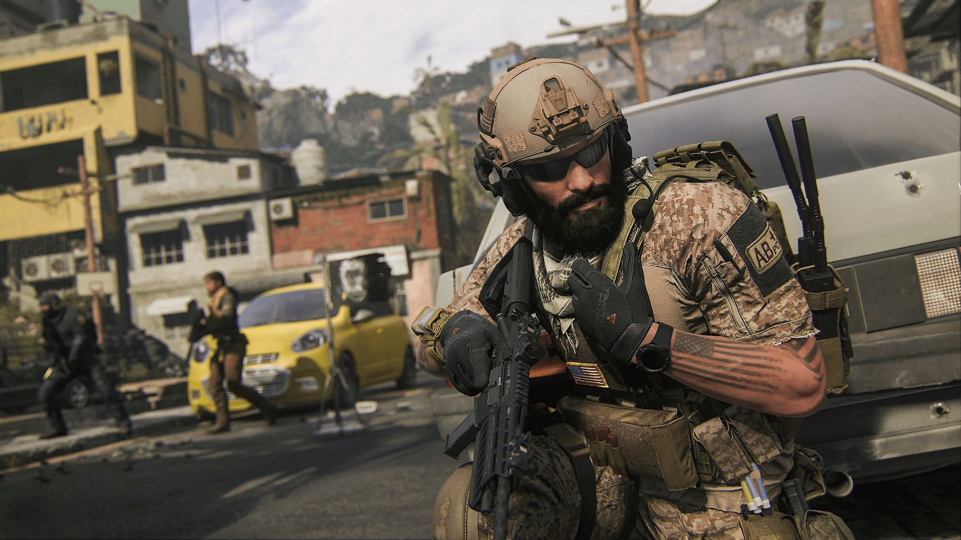 An Operator in Warzone using their microphone while taking cover behind a car