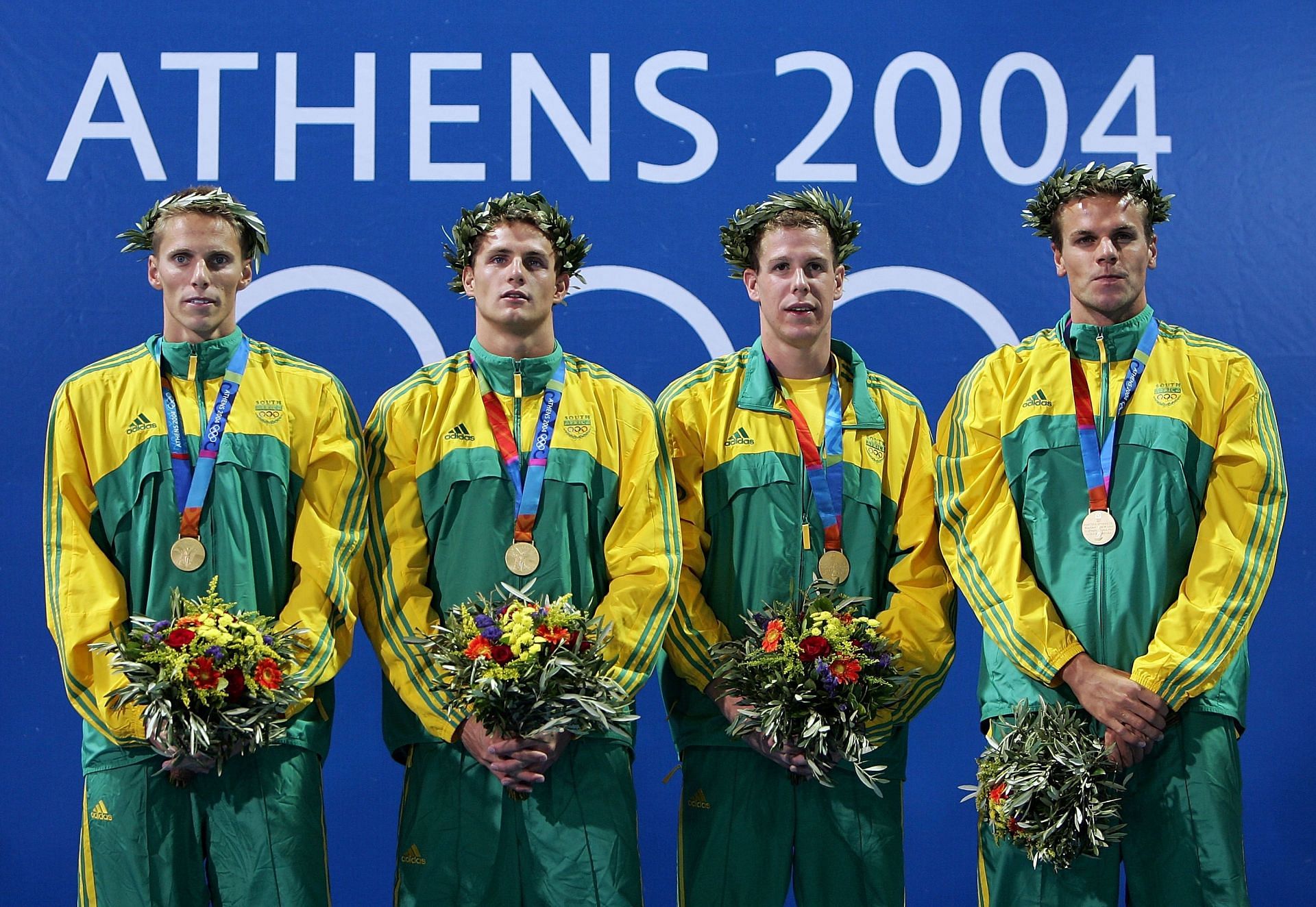 Team South Africa stand on the podium during the men&#039;s swimming 4x100m freestyle relay medal event during the 2004 Summer Olympic Games in Athens, Greece - Getty Images