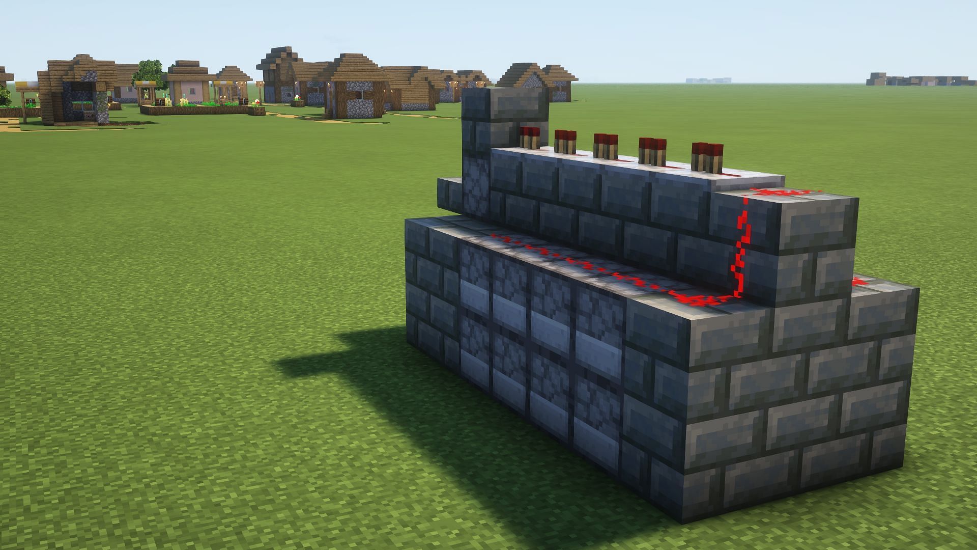 A long-range TNT launcher attacking a village (Image via Mojang)