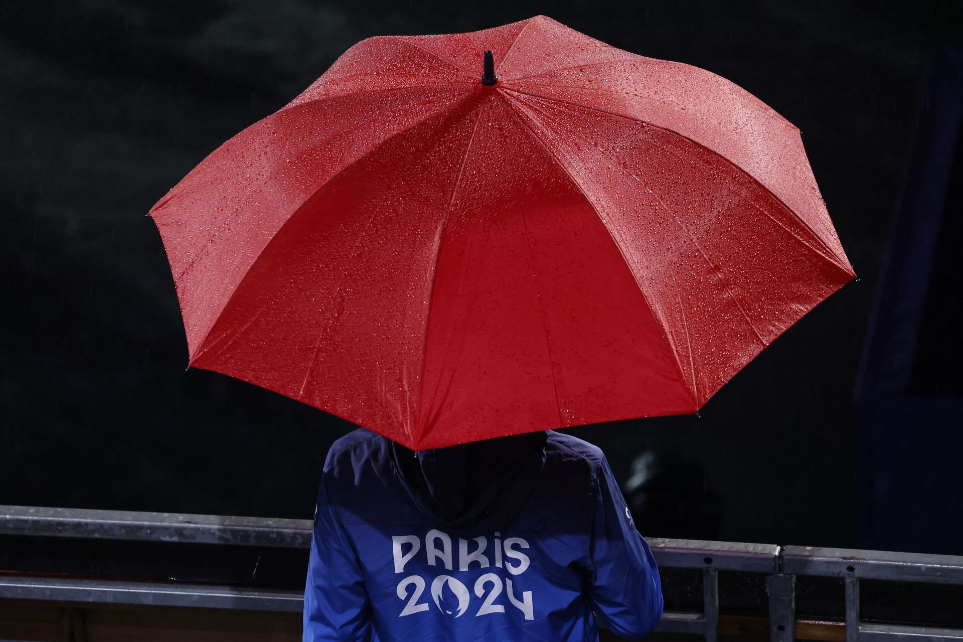 A volunteer spotted during the opening ceremony of the 2024 Paris Olympics - Getty Images