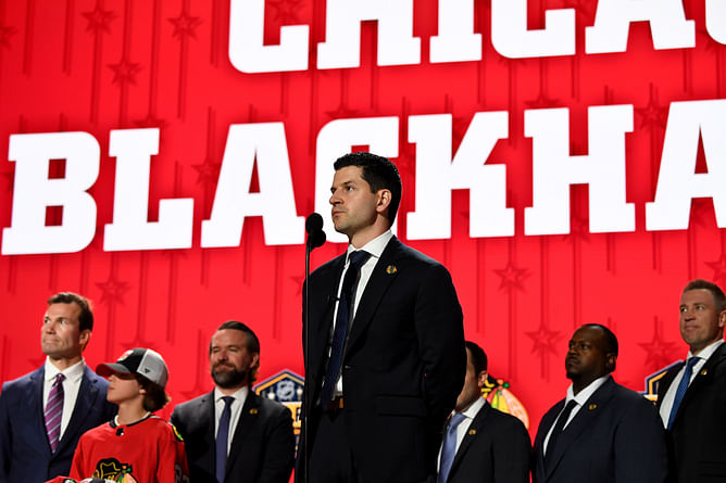 Blackhawks GM Kyle Davidson delivers take on players earning roster spots
