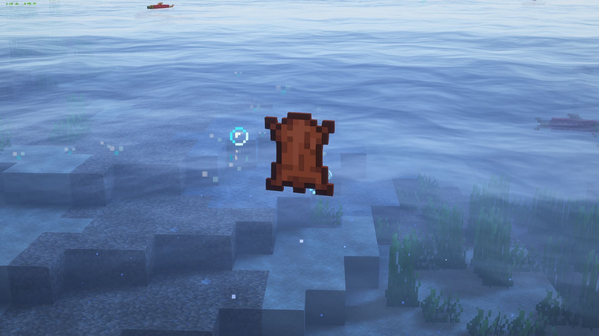 Luck of the sea makes fishing junk, like leather, much less common (Image via Mojang)