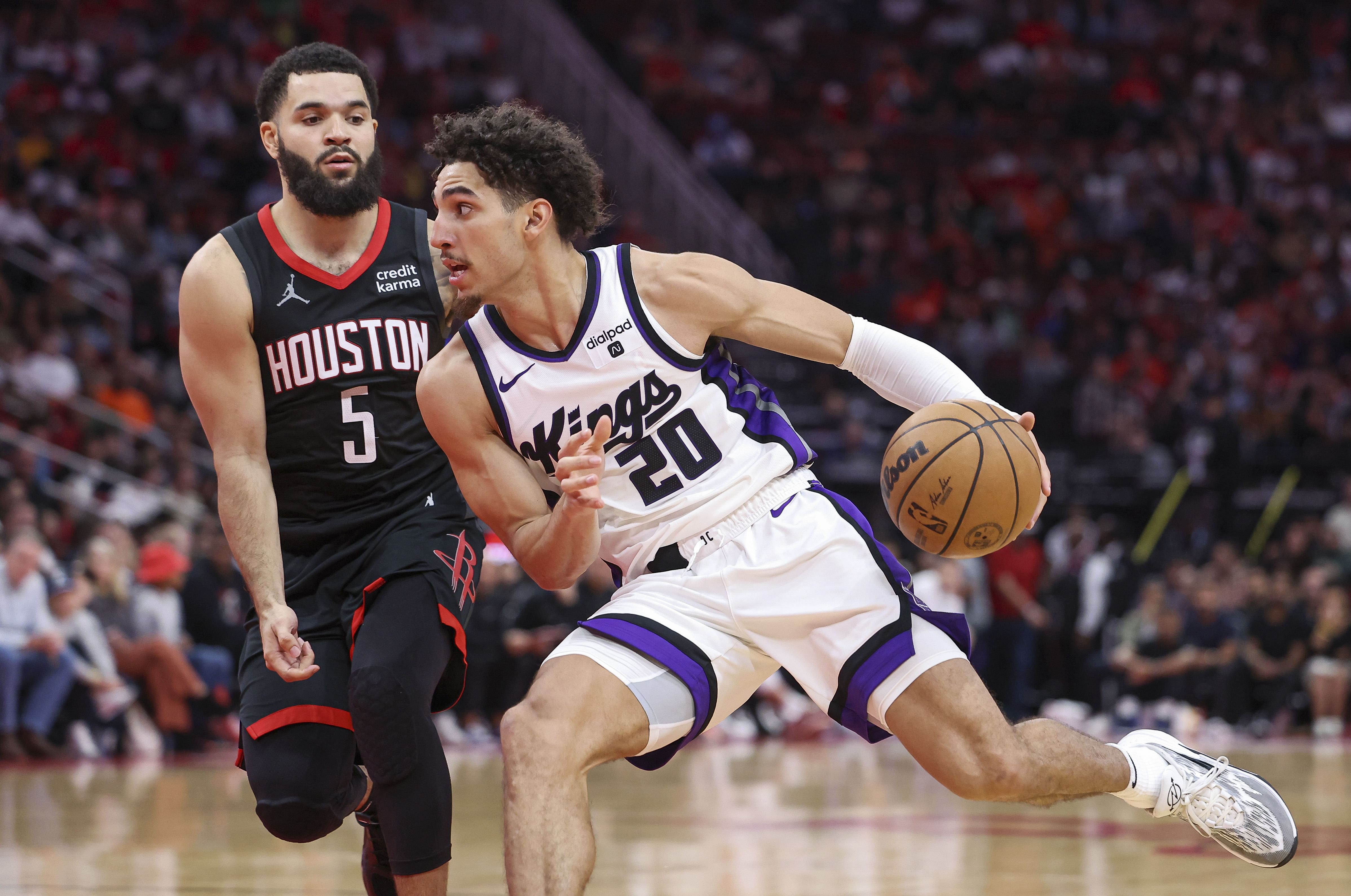 Sacramento Kings guard Colby Jones drives with the ball at Toyota Center. (Photo Credit: Imagn)