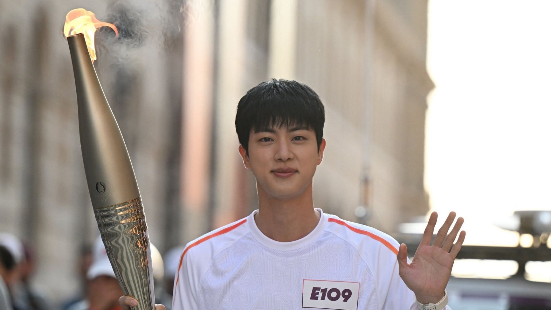 Jin at the Olympic Torch Relay (Image Via X/@olympic) 