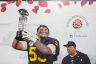 Mason Graham lifting the Rose Bowl after defeating Alabama; Syndication: Detroit Free Press
