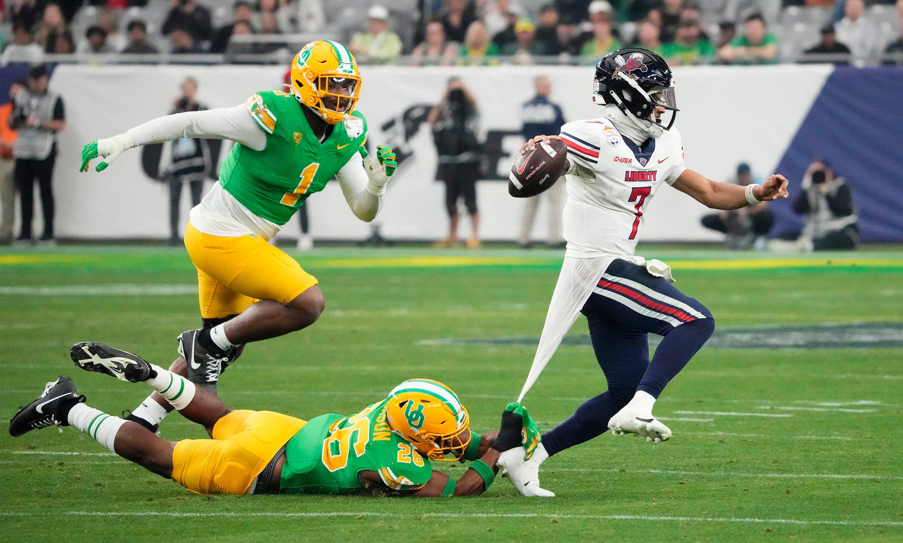 Liberty&#039;s spread option attack led the team to the Fiesta Bowl and will do well in College Football 25. (Photo credit: IMAGN)