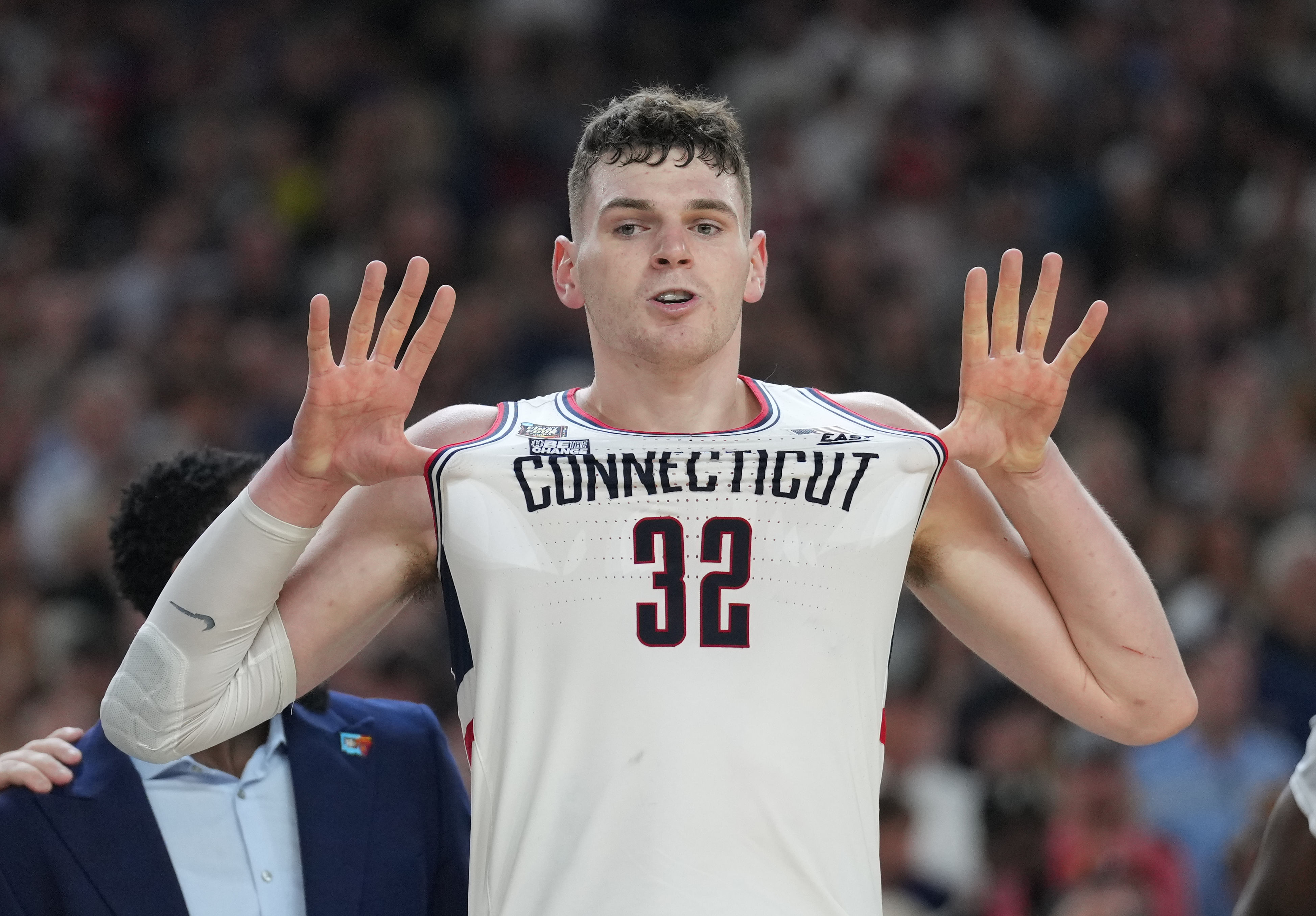 Connecticut Huskies center Donovan Clingan (32) celebrates defeating the Purdue Boilermakers in the national championship. Photo Credit: Imagn