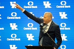 PHOTO: Kentucky’s Mark Pope and Jason Hart mark their attendance for 2026 five-star guard Brandon McCoy