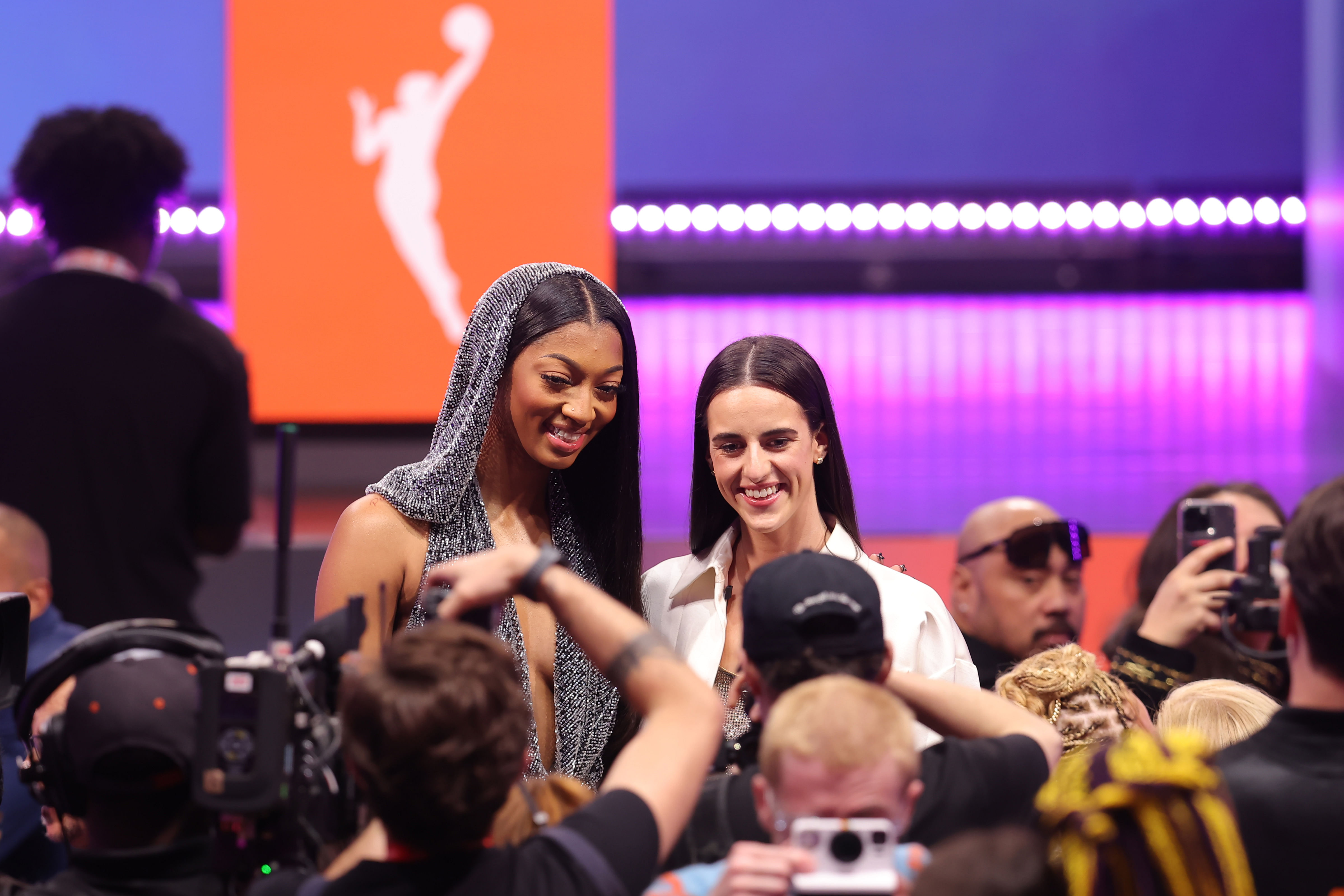 Angel Reese and Caitlin Clark pose together at the 2024 WNBA Draft at Brooklyn Academy of Music. Photo Credit: Imagn