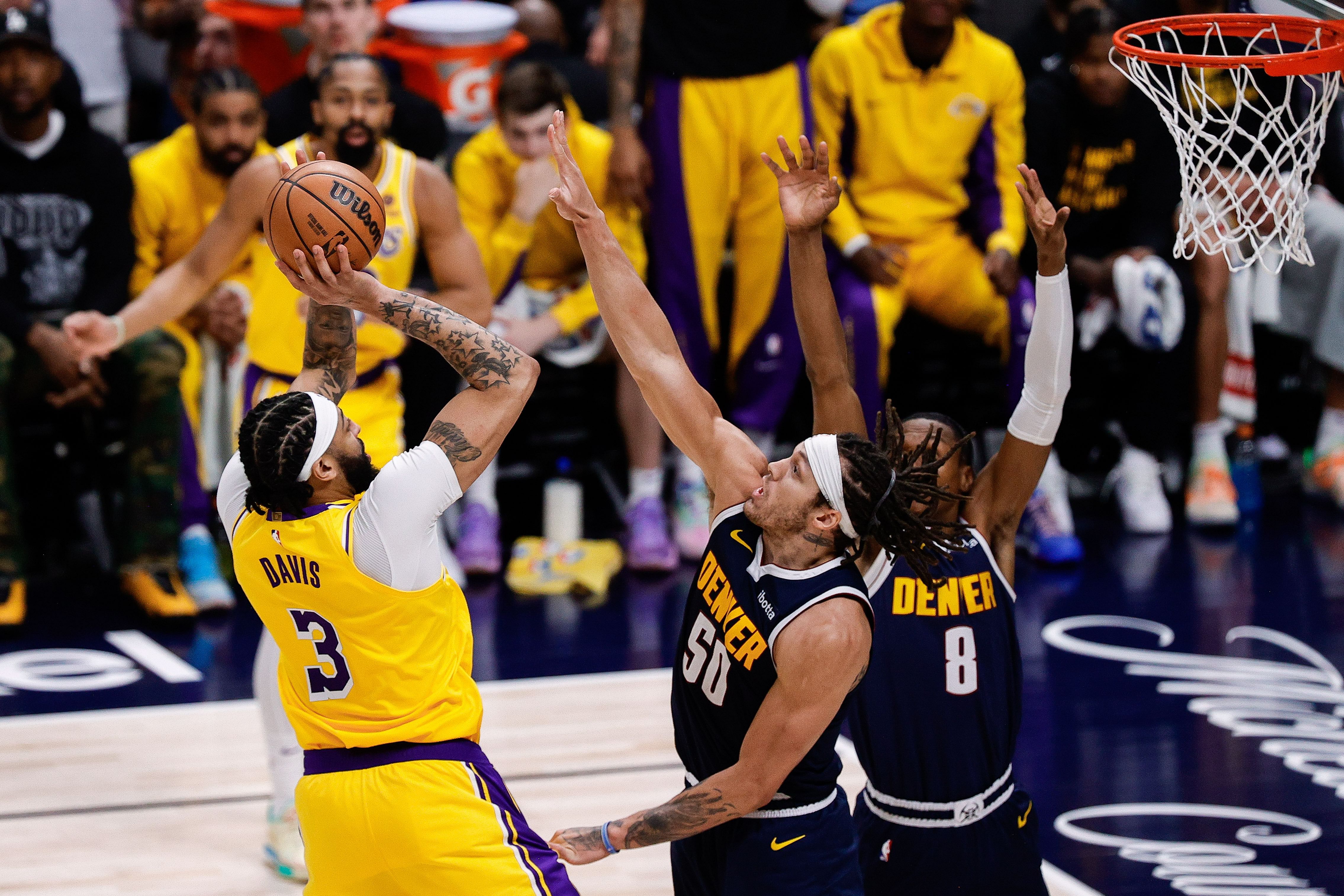 LA Lakers forward Anthony Davis shooting over Denver Nuggets forward Aaron Gordon in the first round of the 2024 NBA Playoffs.