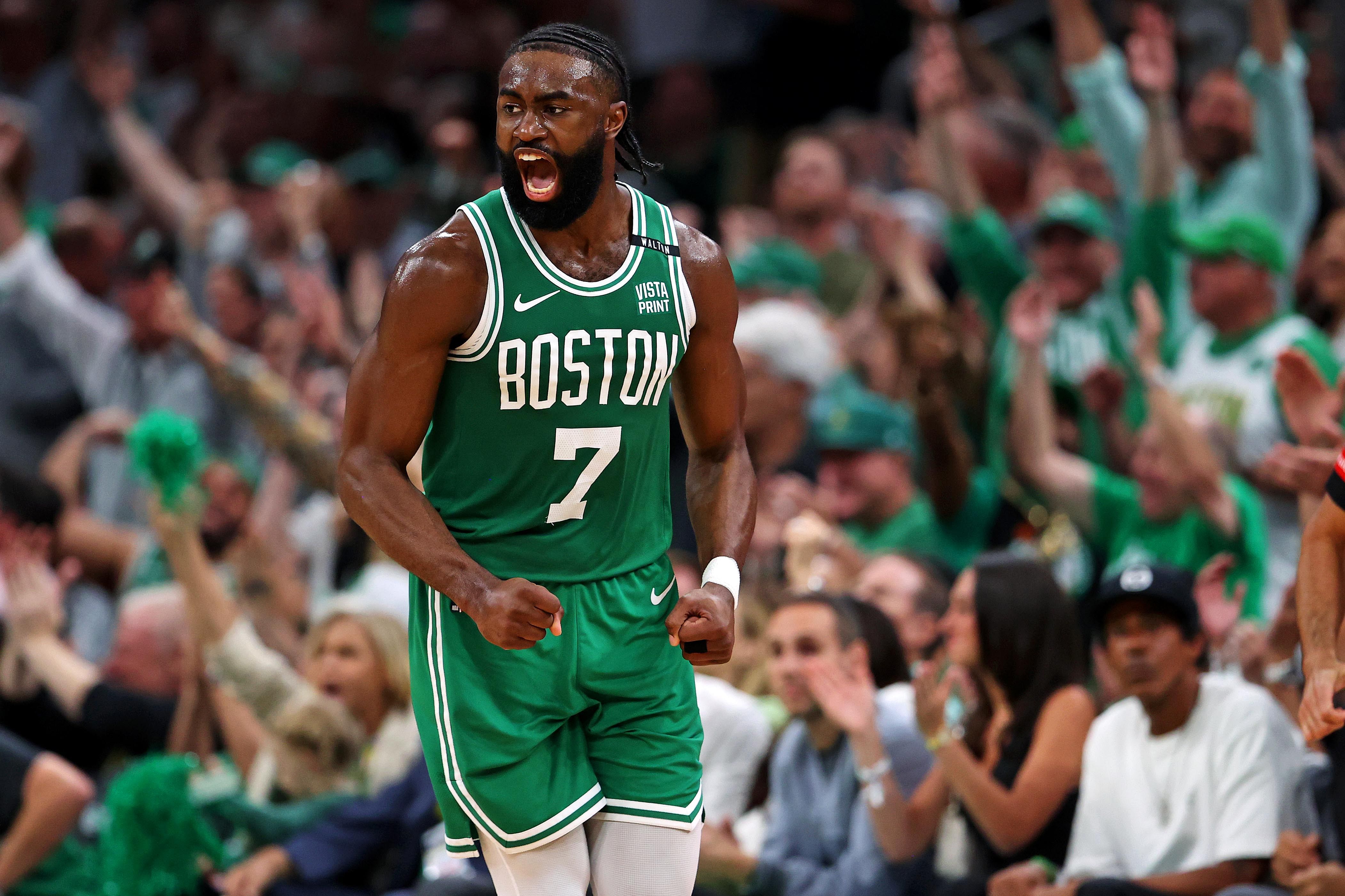 Boston Celtics guard Jaylen Brown (7) celebrates after making a three pointer against the Dallas Mavericks in game five of the 2024 NBA Finals at TD Garden. (image credit: IMAGN)