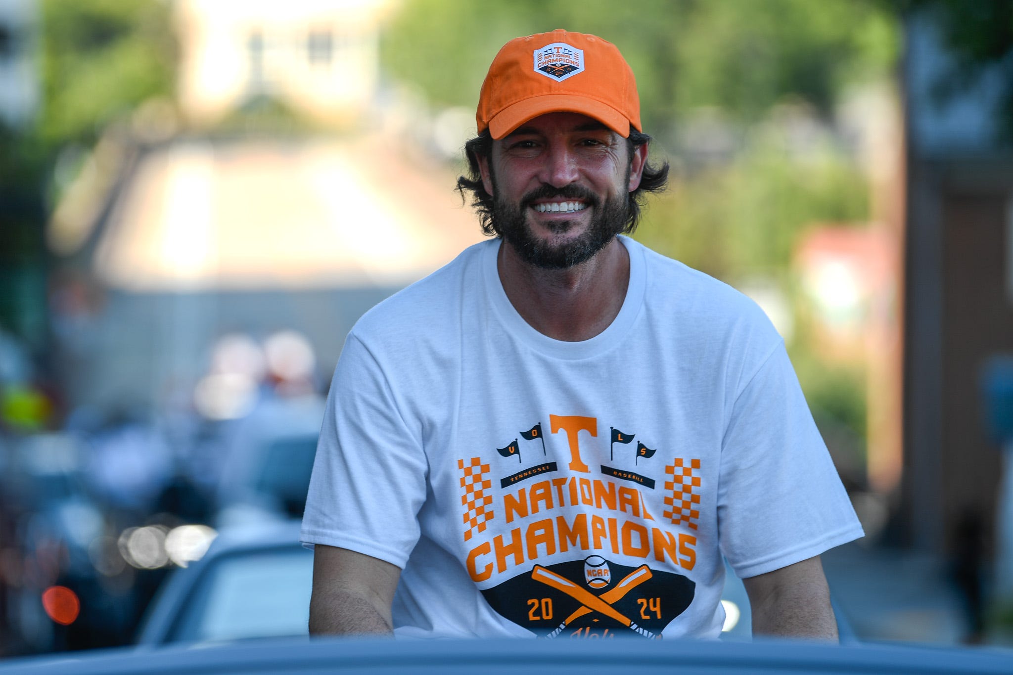 Vols head coach Tony Vitello smiles ahead of the Knoxville homecoming parade