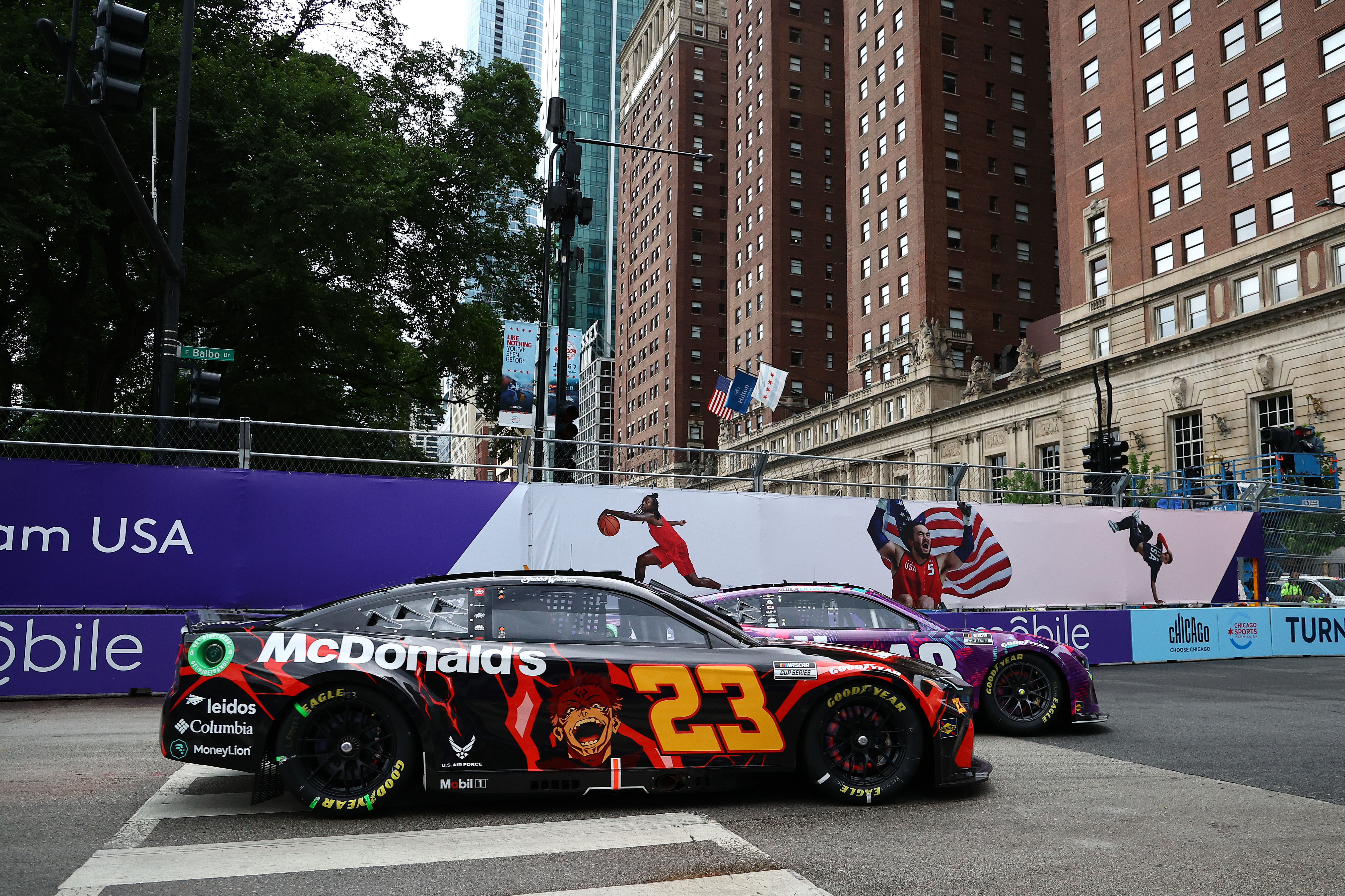 NASCAR: Grant Park 165: NASCAR Cup Series driver Alex Bowman (48) and driver Bubba Wallace (23) race side by side during the Grant Park 165 at Chicago Street Race. Mandatory Credit: Mike Dinovo-USA TODAY Sports