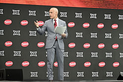 IN PHOTOS: Big 12 Commissioner Brett Yormark rocks red tie with grey suit as media day 1 commences in full force
