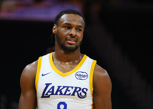 Los Angeles Lakers guard Bronny James Jr. between plays against the Miami Heat. Photo Credit: Kelley L Cox-USA TODAY Sports