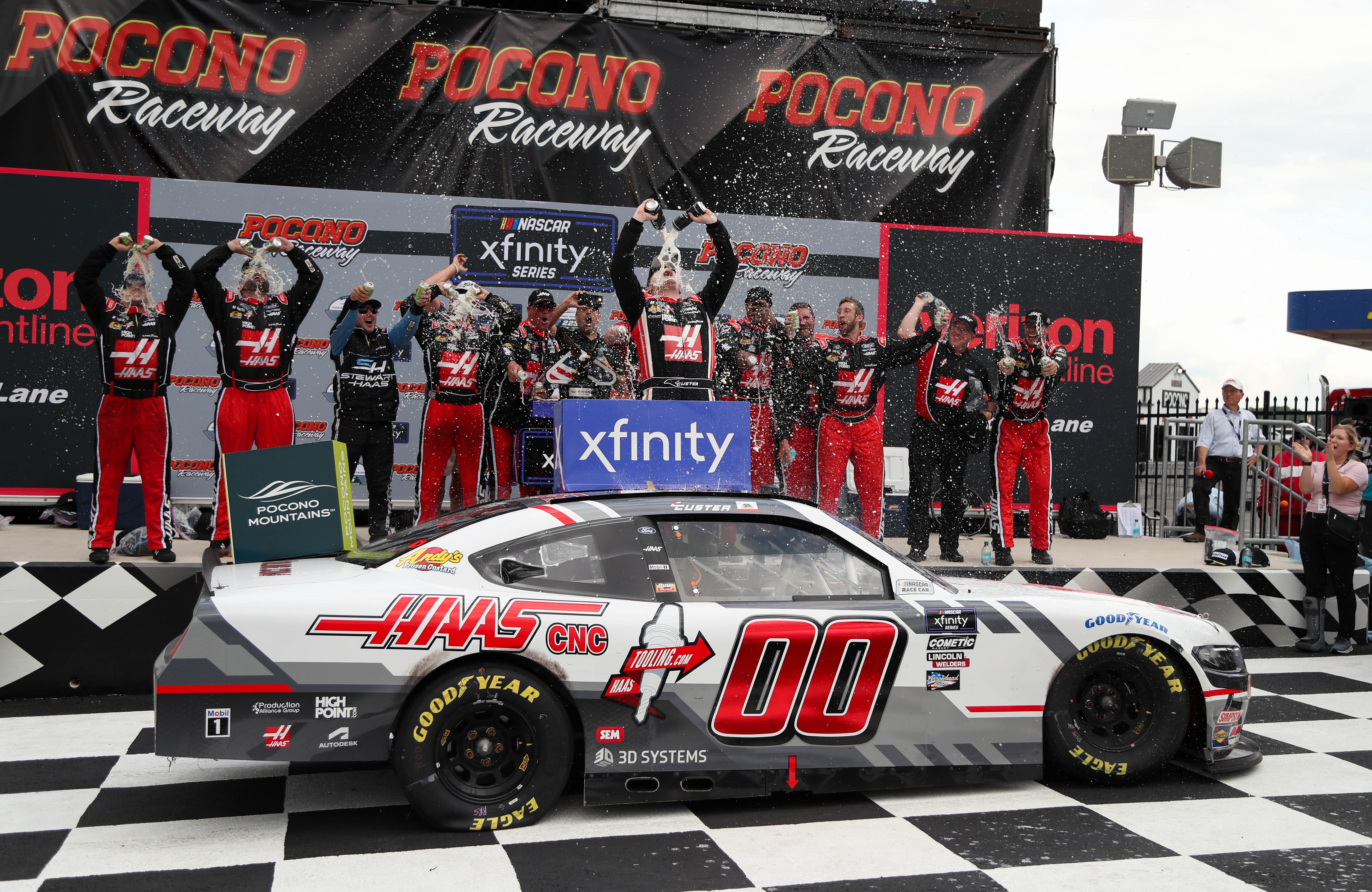 Long Pond, Pennsylvania, USA; NASCAR Xfinity Series driver Cole Custer celebrates in victory lane after winning the Explore The Pocono Mountains 225 at Pocono Raceway. Mandatory Credit: Matthew O&#039;Haren-USA TODAY Sports