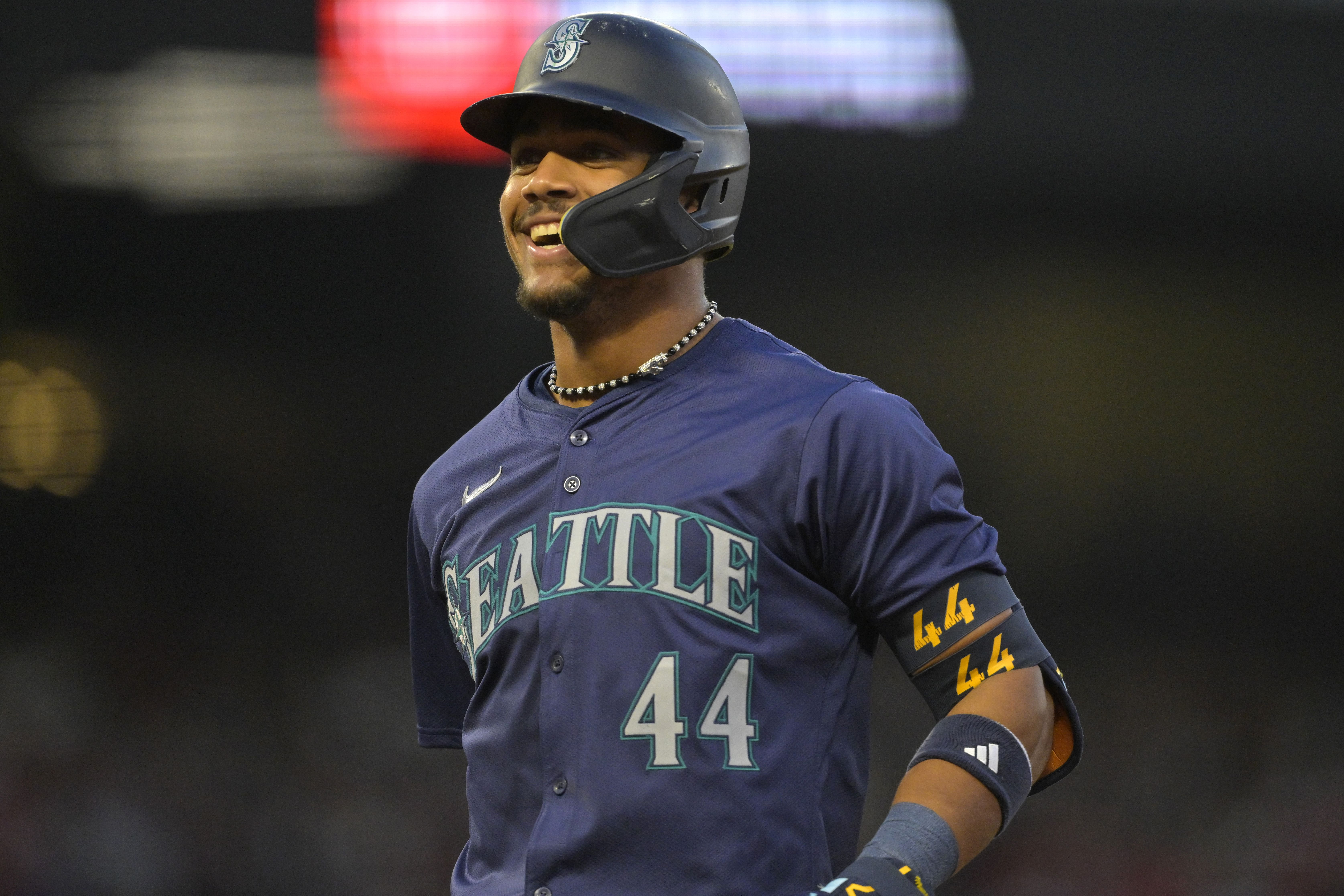 Julio Rodriguez of the Seattle Mariners smiles after a single