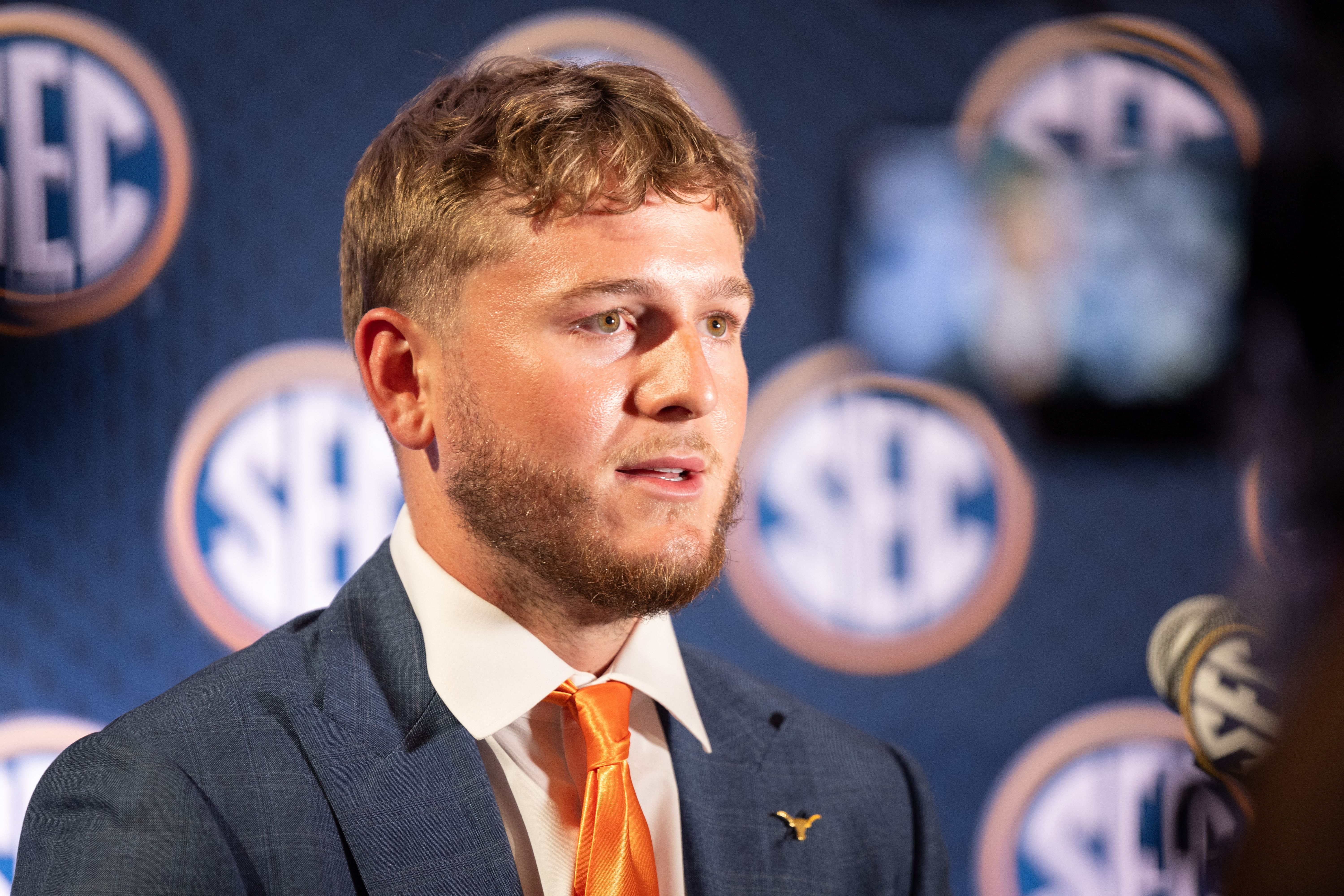 Texas quarterback Quinn Ewers speaking at Omni Dallas Hotel. (Image credit: Imagn)