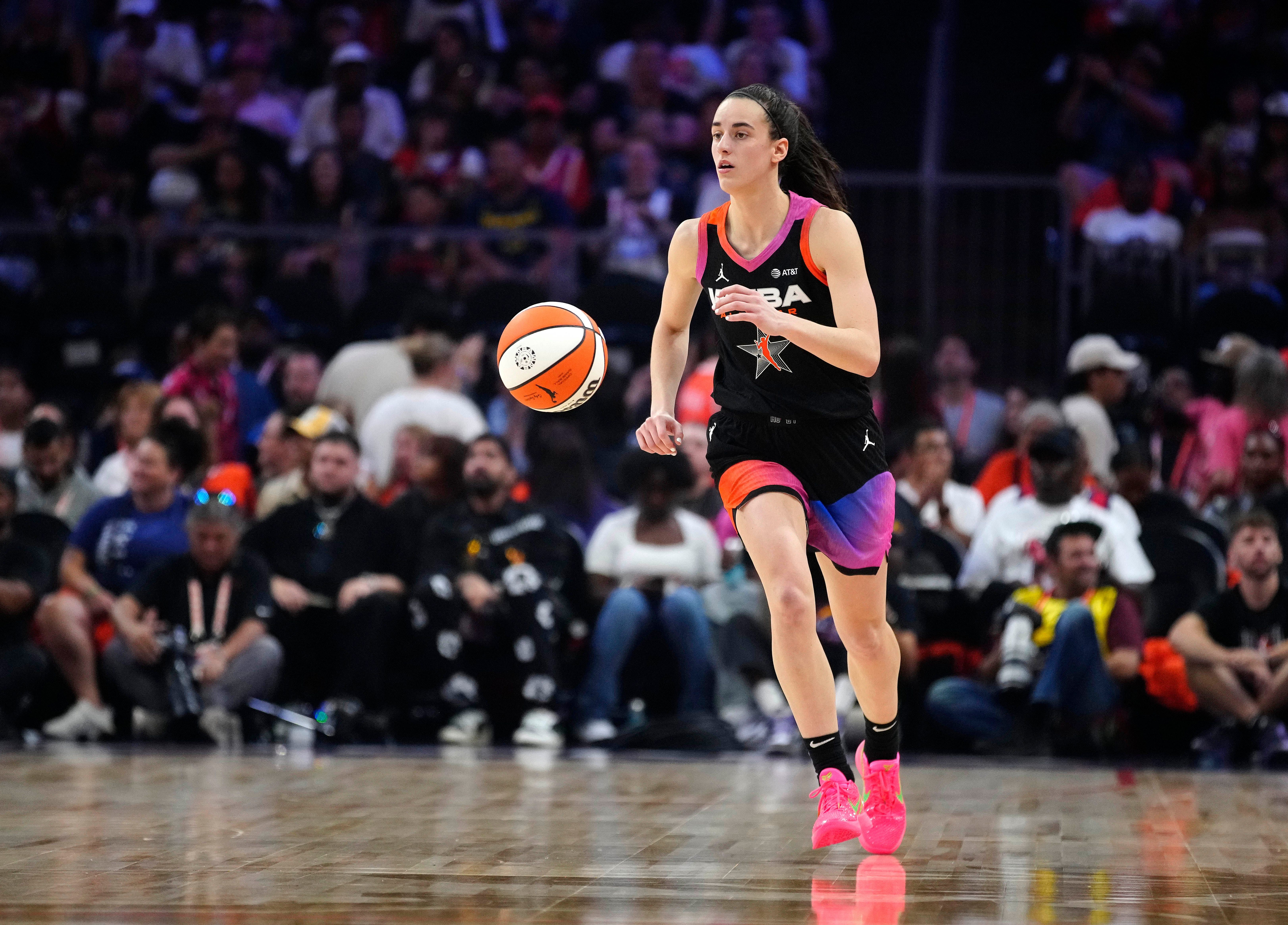 Indiana Fever rookie Caitlin Clark playing at the 2024 WNBA All-Star Game (IMAGN)