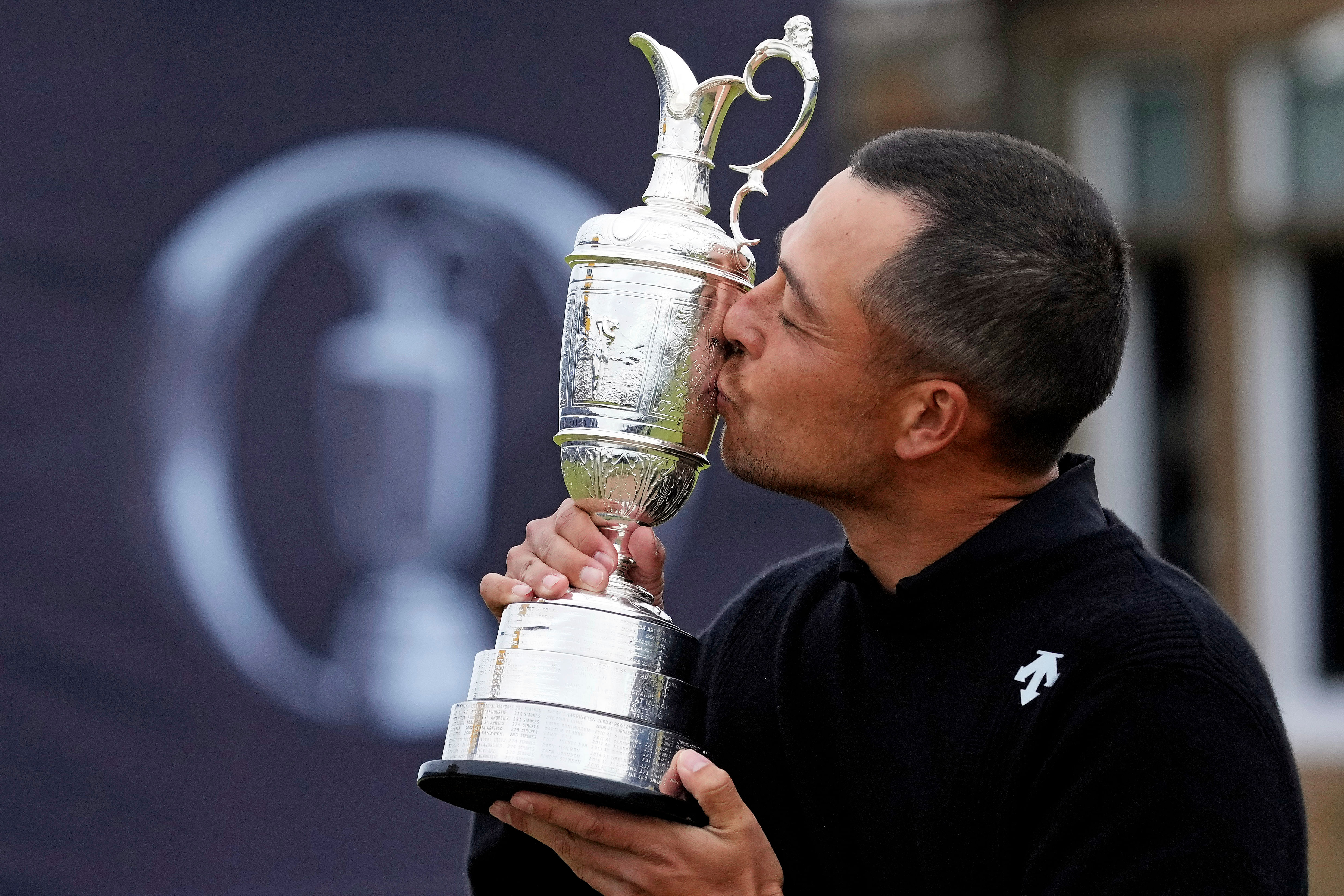 Xander Schauffele celebrates after winning The Open Championship (Image via Imagn)