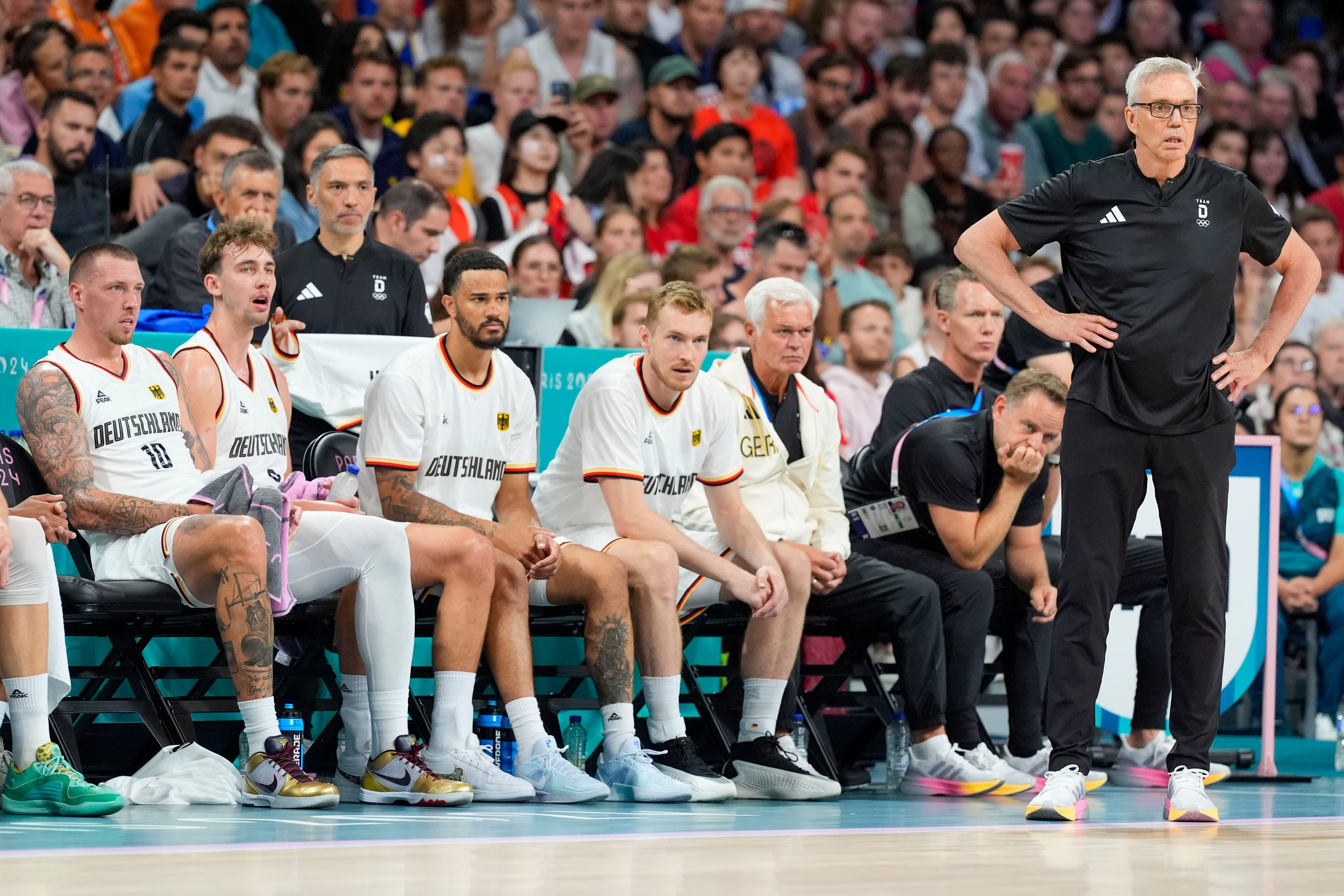 German head coach Gordie Herbert looks out on the court during the 2024 Paris Olympics at Stade Pierre-Mauroy. Photo Credit: Imagn