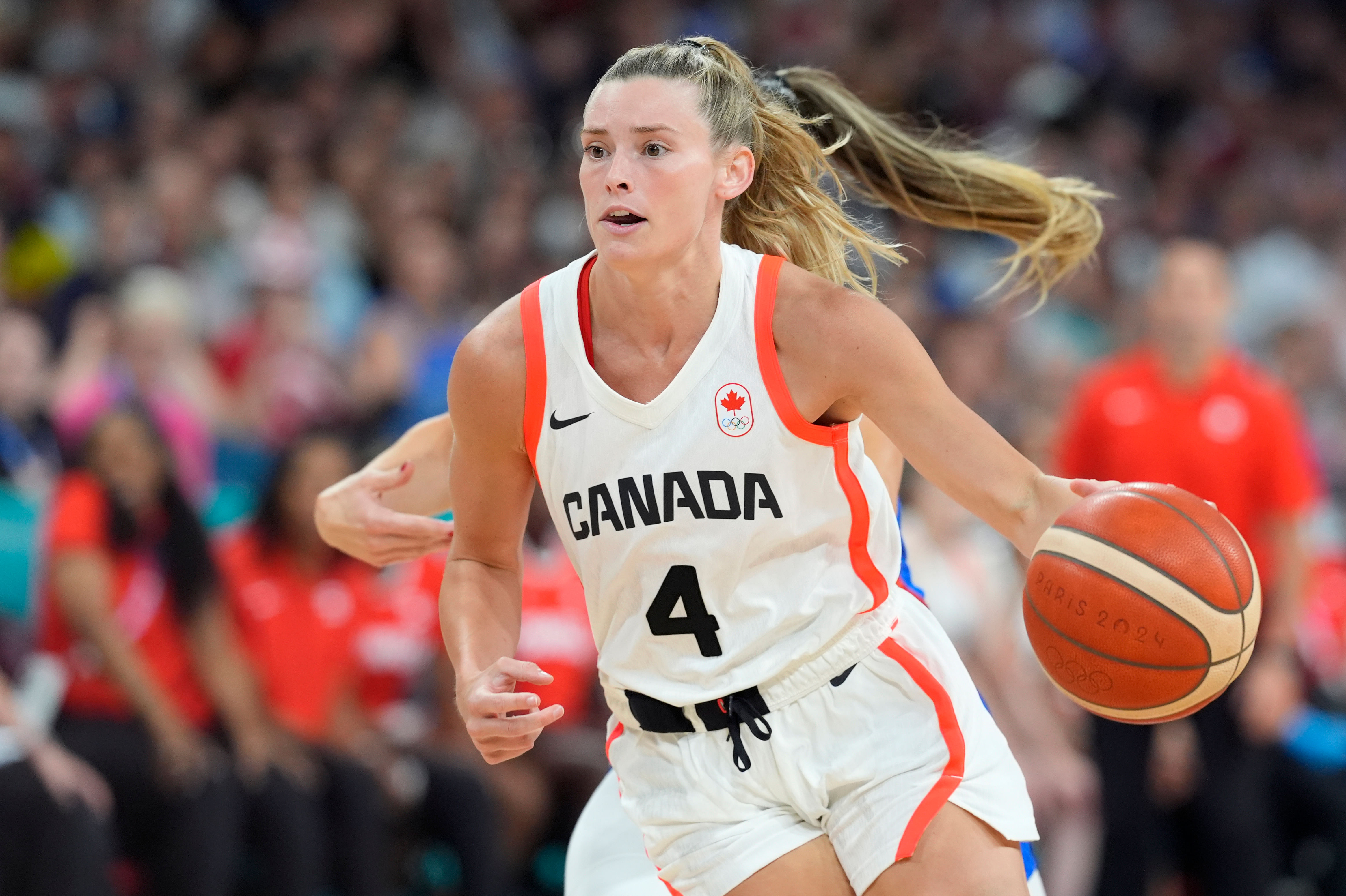 Canada guard Sami Hill dribbles the ball past France guard Romane Bernies at the 2024 Paris Olympics at Stade Pierre-Mauroy. Image Credit: Imagn