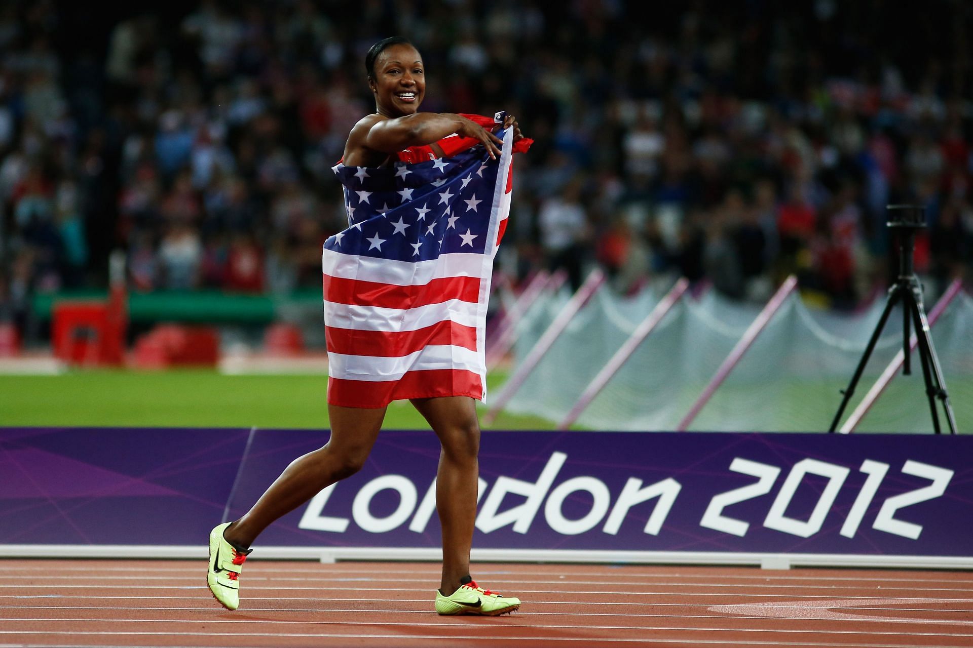 Carmelita Jeter after winning the silver medal in 100 m at London Olympics 2012 [Image Source: Getty]