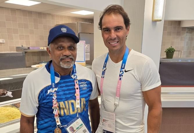 Indian tennis team coach Balachandran Manikkath meets Rafael Nadal at the Paris Olympics village