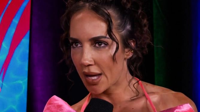 Former world champion nearly retired seconds before blockbuster WWE RAW debut; credits Chelsea Green