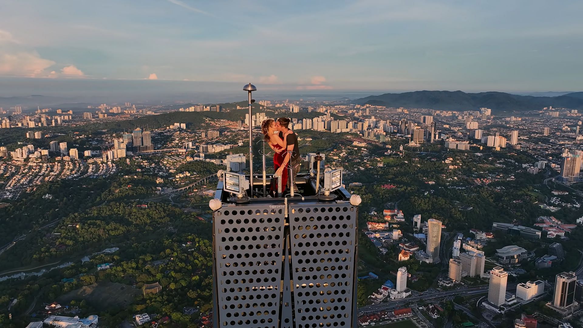 Angela and Ivan succeeded in their high-risk goal of scaling the Merdeka 118 (Image via Netflix)