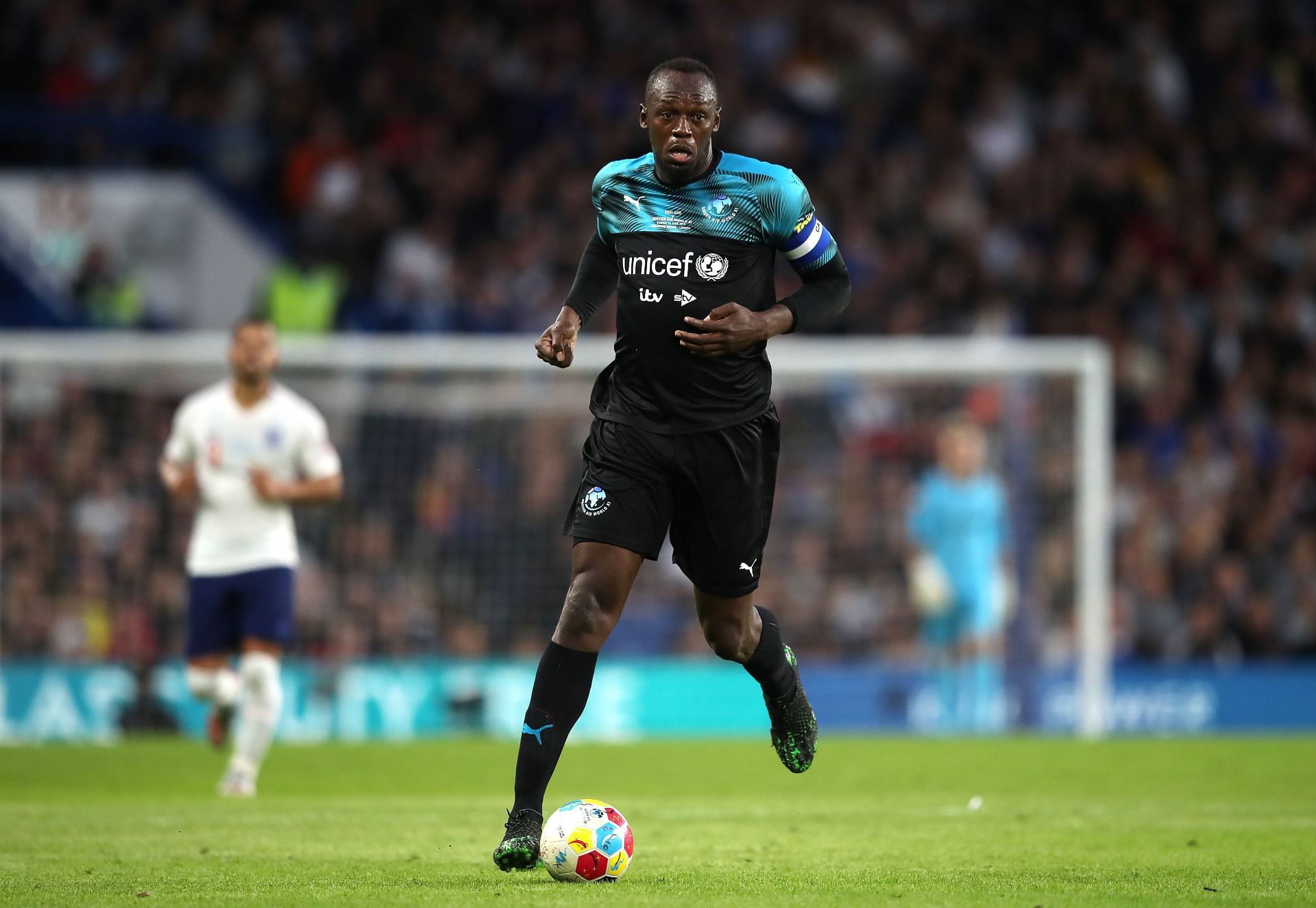 Usain Bolt in action in the Soccer Aid match (Image via Getty)