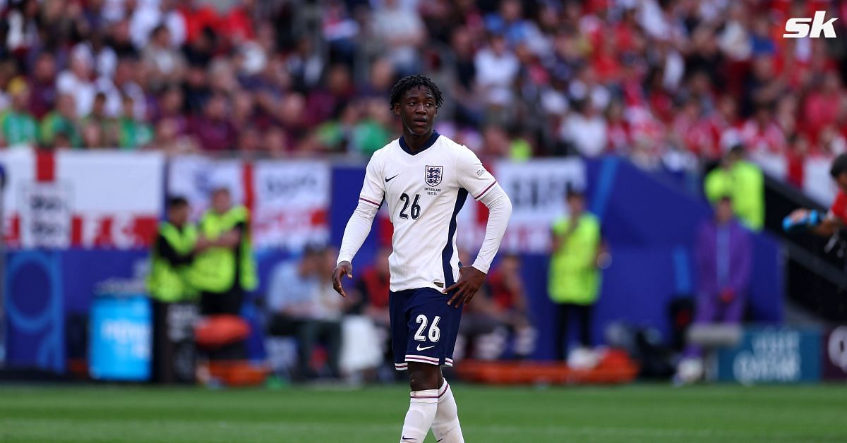 Kobbie Mainoo reacts after England