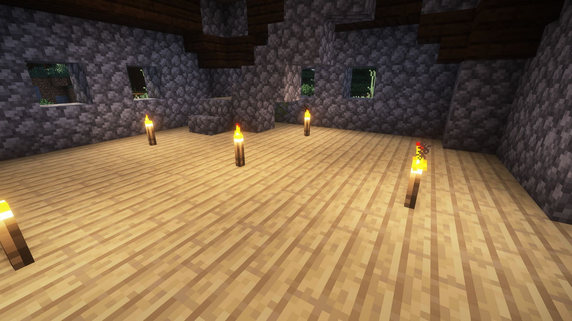 Lighting up the area will stop more pillagers from spawning during construction (Image via Mojang)