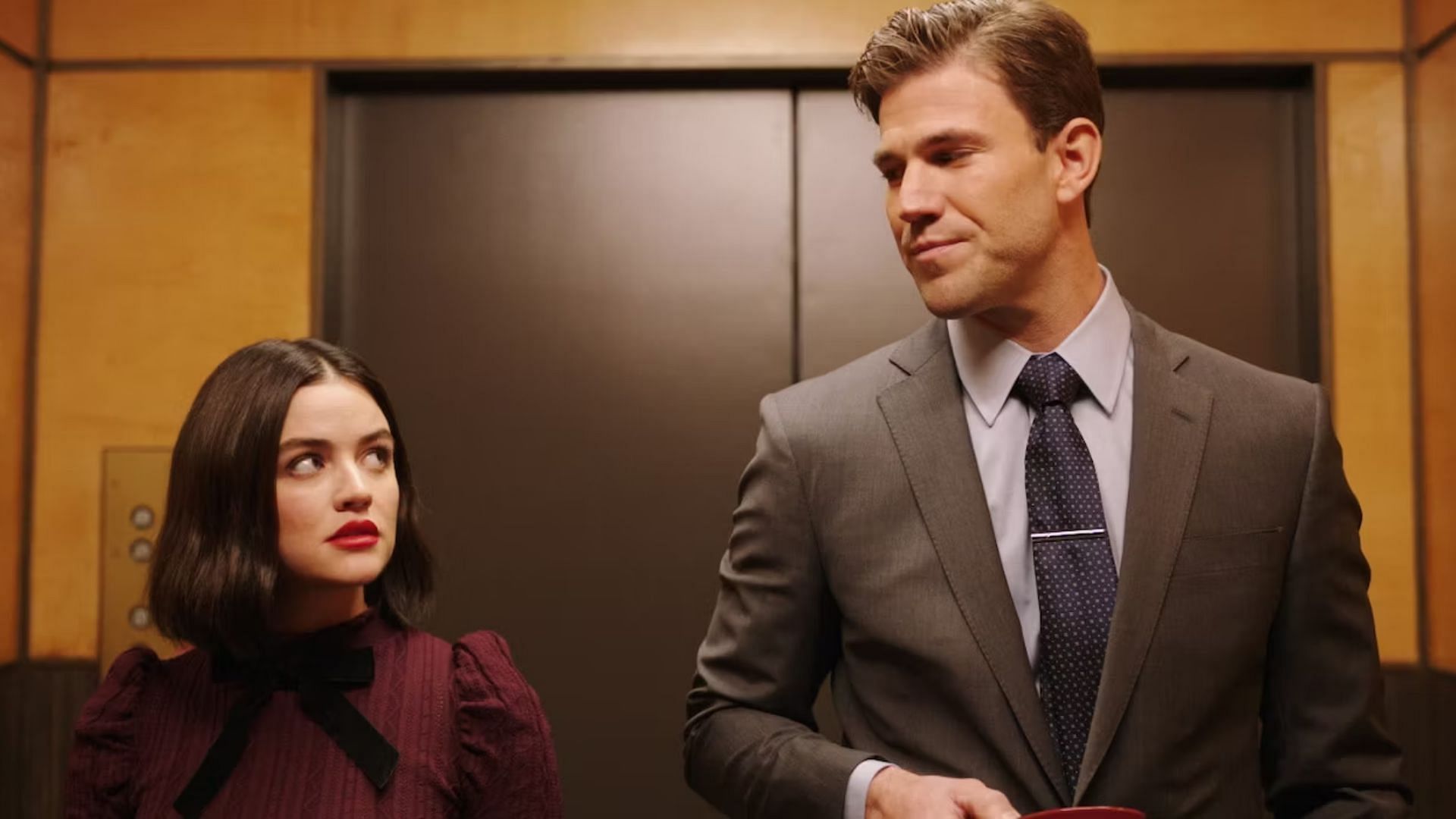 Lucy Hale and Austin Stowell in The Hating Game (Image via Vertical Entertainment)