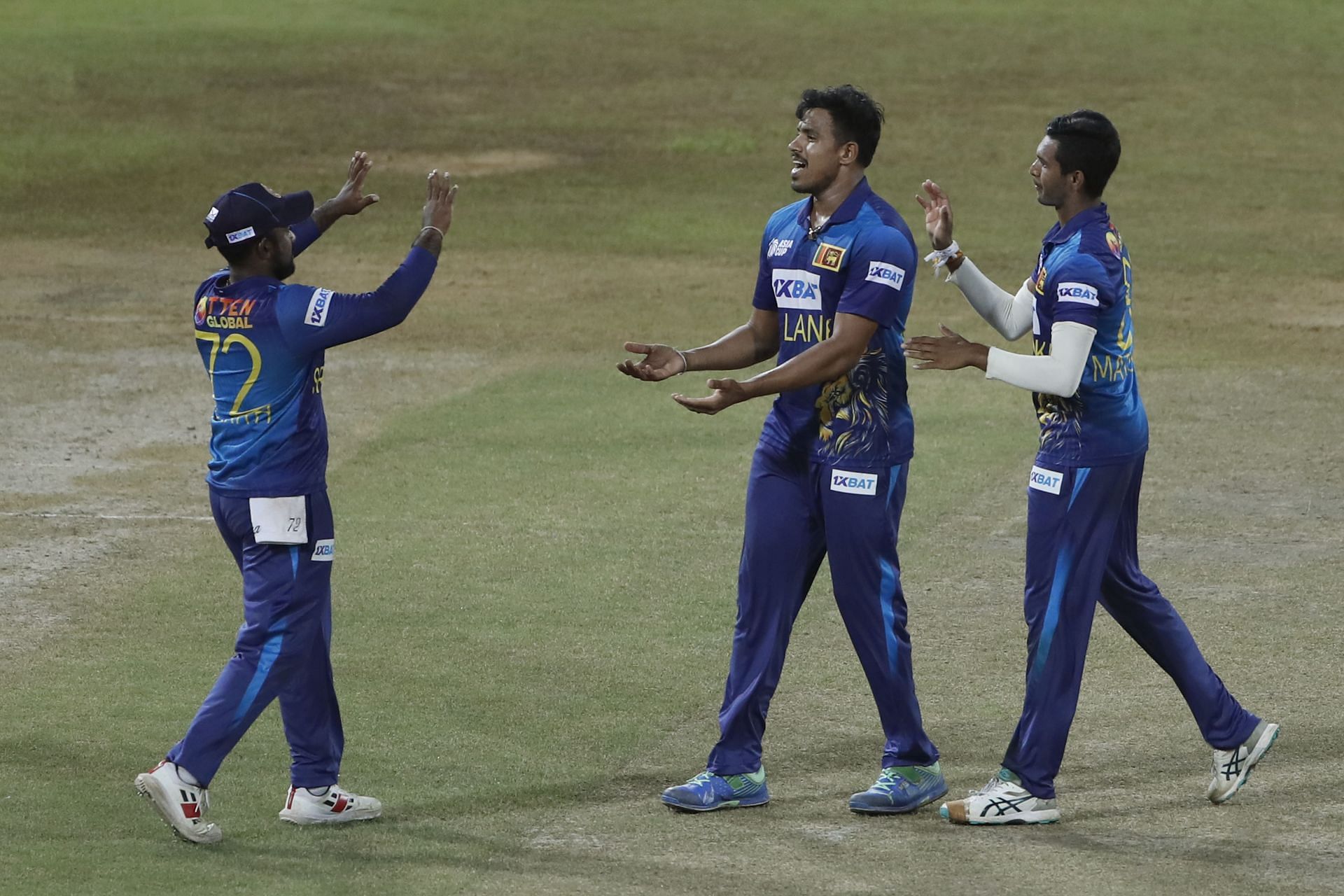 Maheesh Theekshana (middle) in action for Sri Lanka.