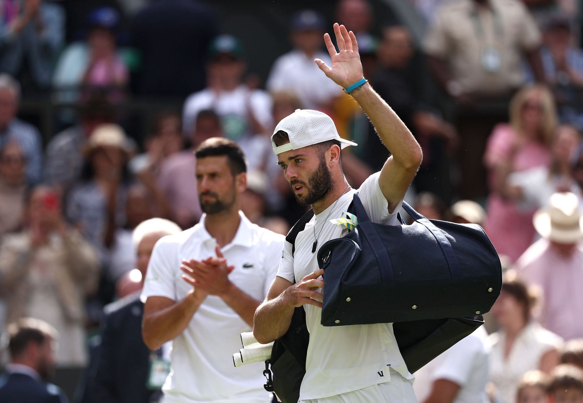 Novak Djokovic applauds Jacob Fearnley at The Championships - Wimbledon 2024