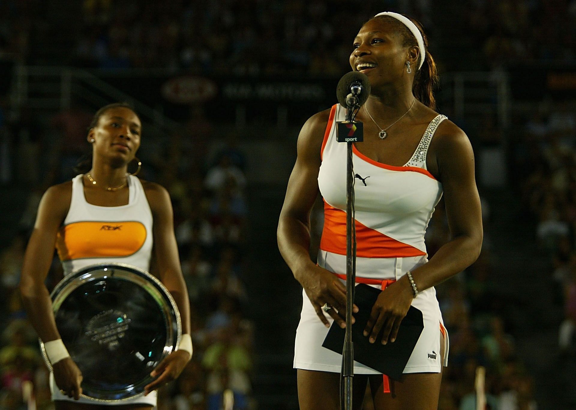 Venus Williams (L) and Serena Williams (R) during the trophy presentation ceremony after the conclusion of the 2003 Australian Open women&#039;s singles final