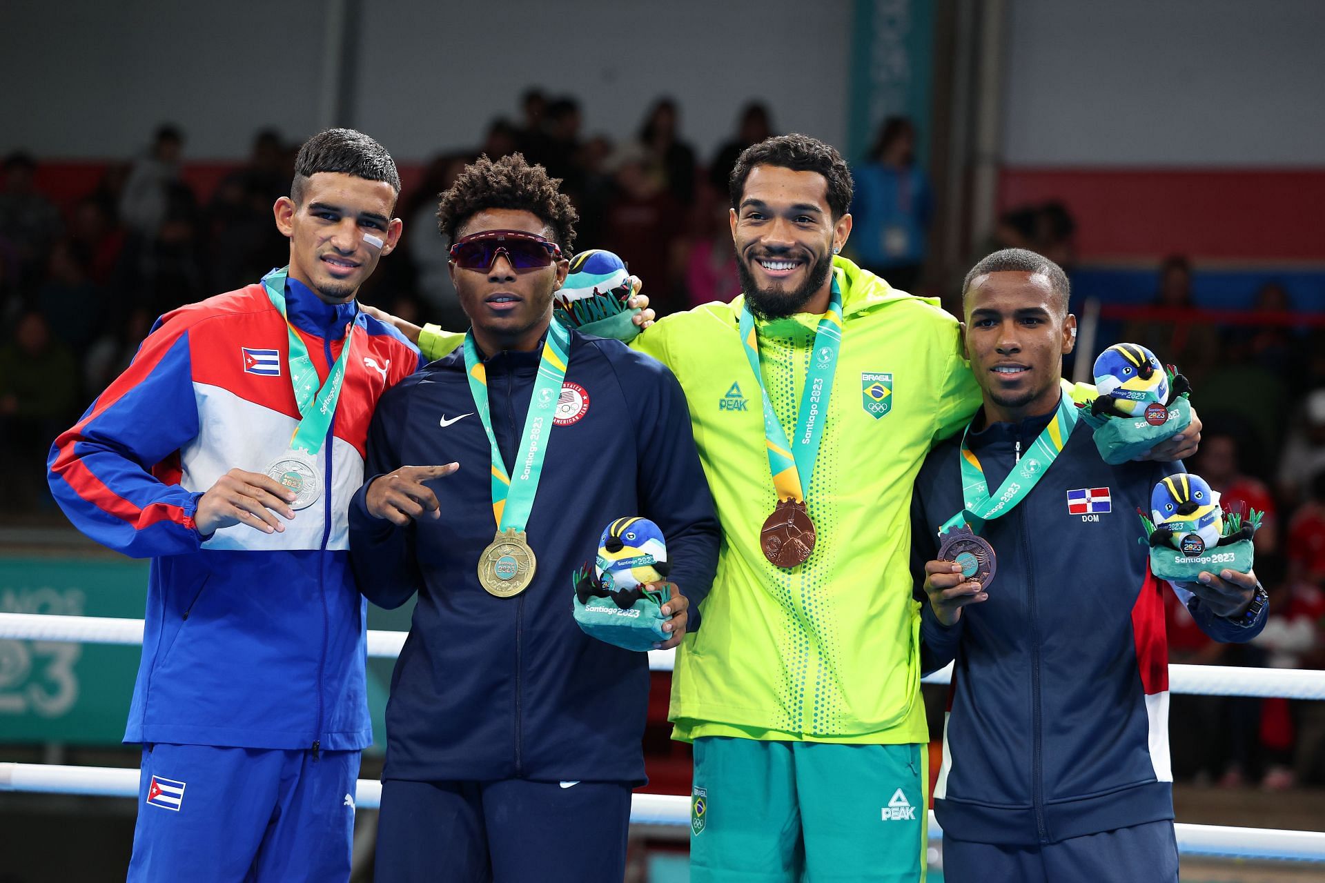 Jahmal Harvey [2nd from left] with other medalists at the Pan Am Games 2023 [Image Source: Getty]