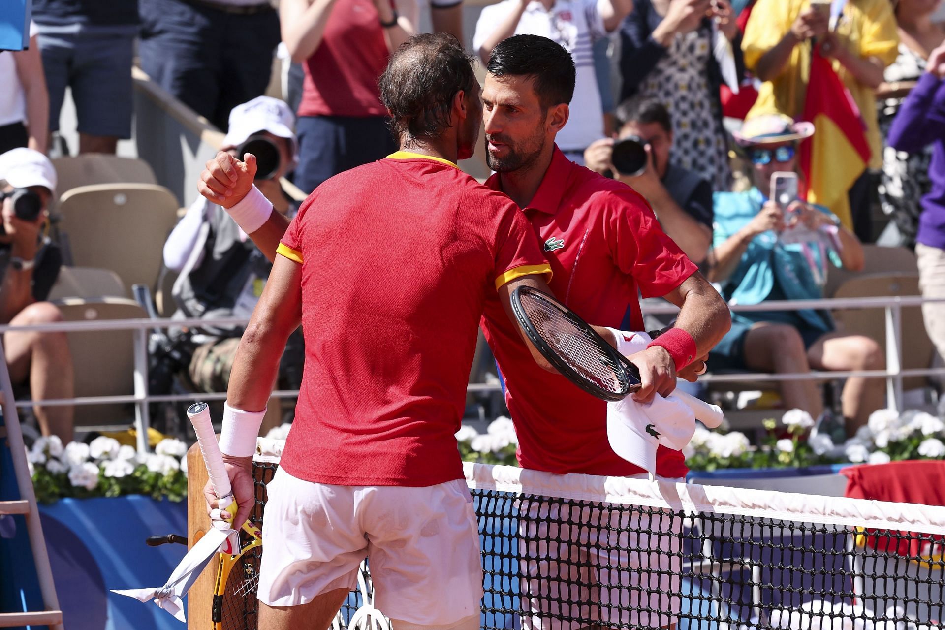 Djokovic and Nadal sharing an embrace after their duel (Image source: GETTY)