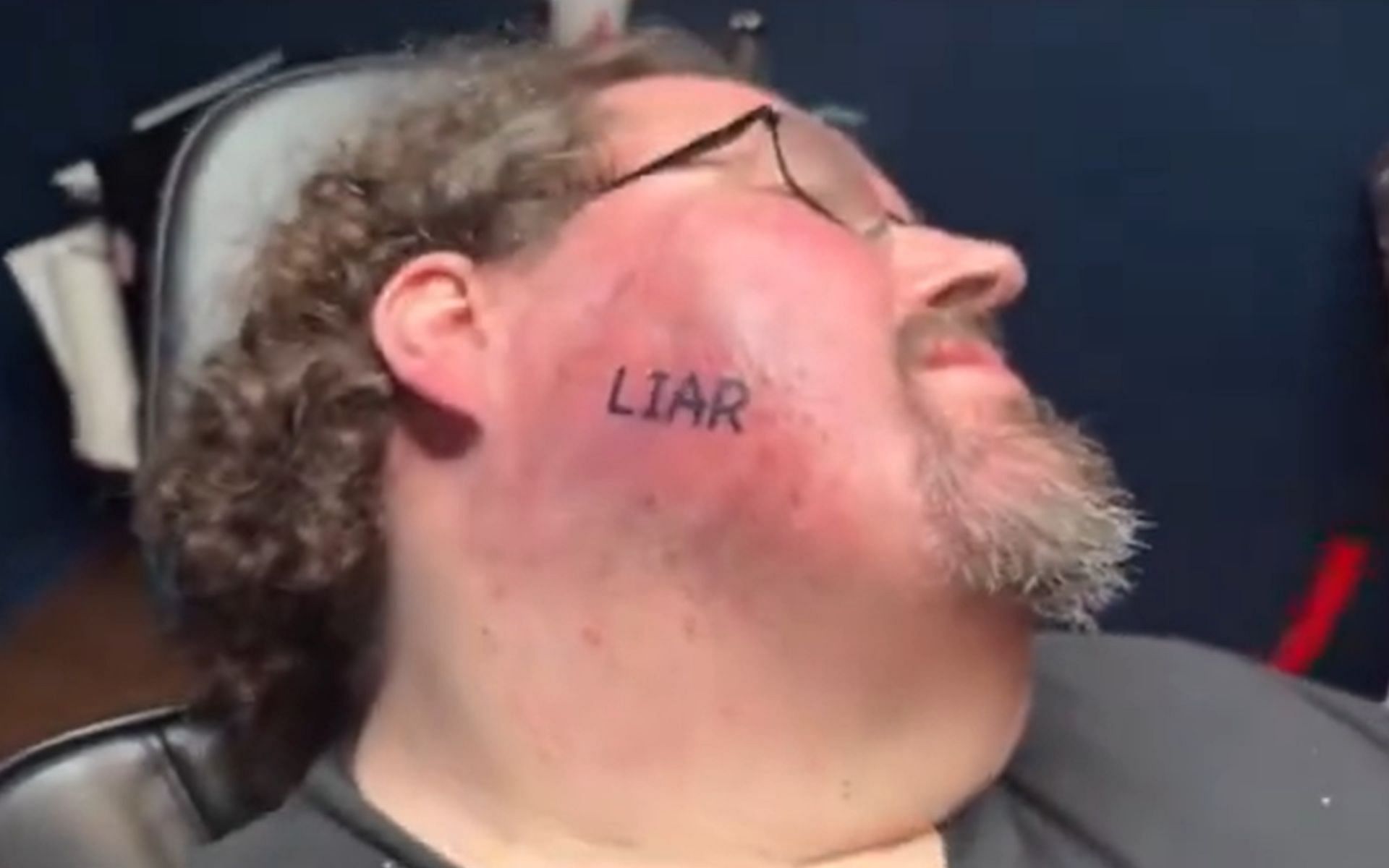 Boogie2988 seemingly gets &quot;LIAR&quot; tattooed on his face